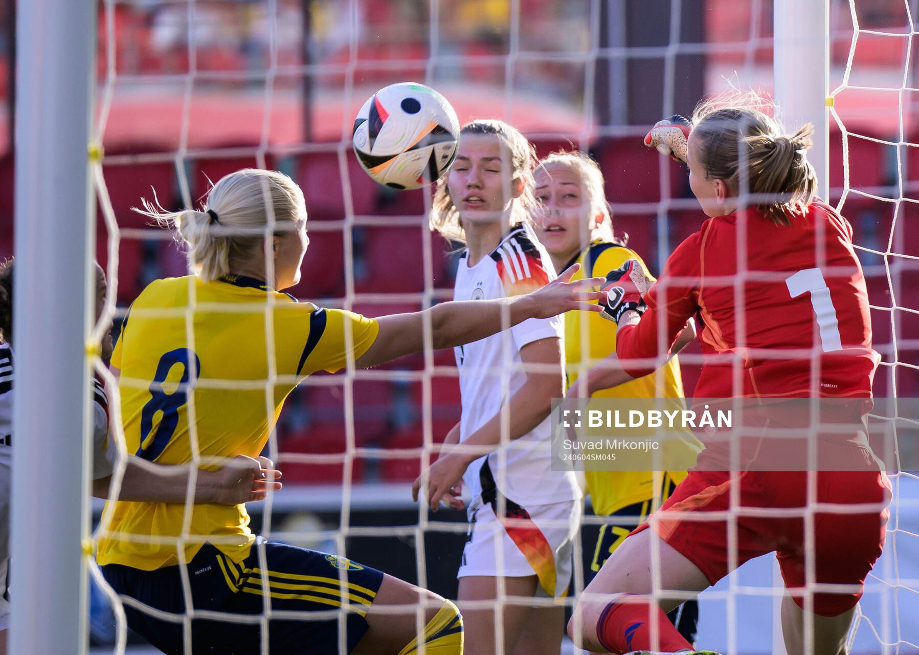 Wilma Leidhammar of Sweden and Goalkeeper Paula Hoppe of