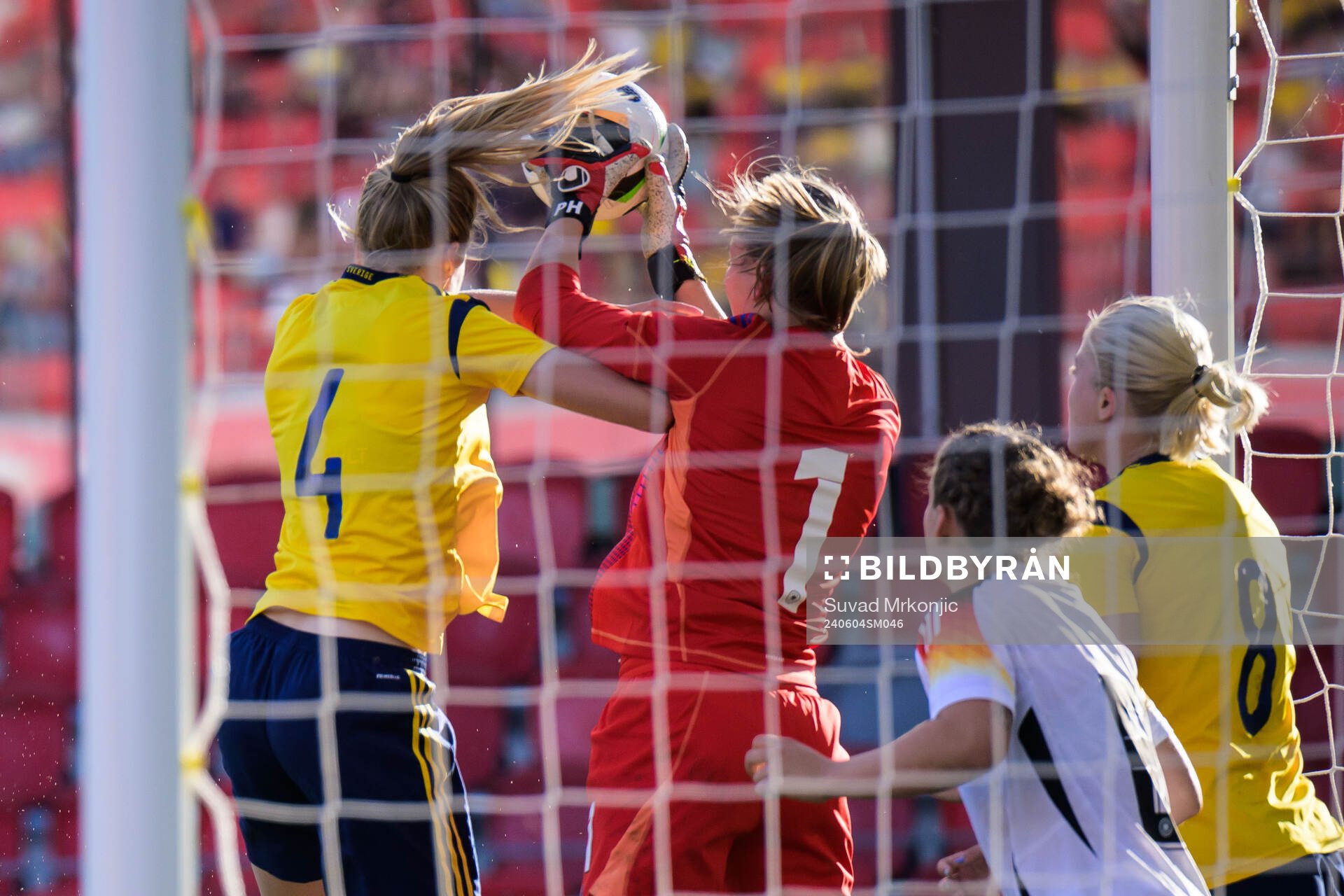 Ebba Handfast of Sweden and Goalkeeper Paula Hoppe of