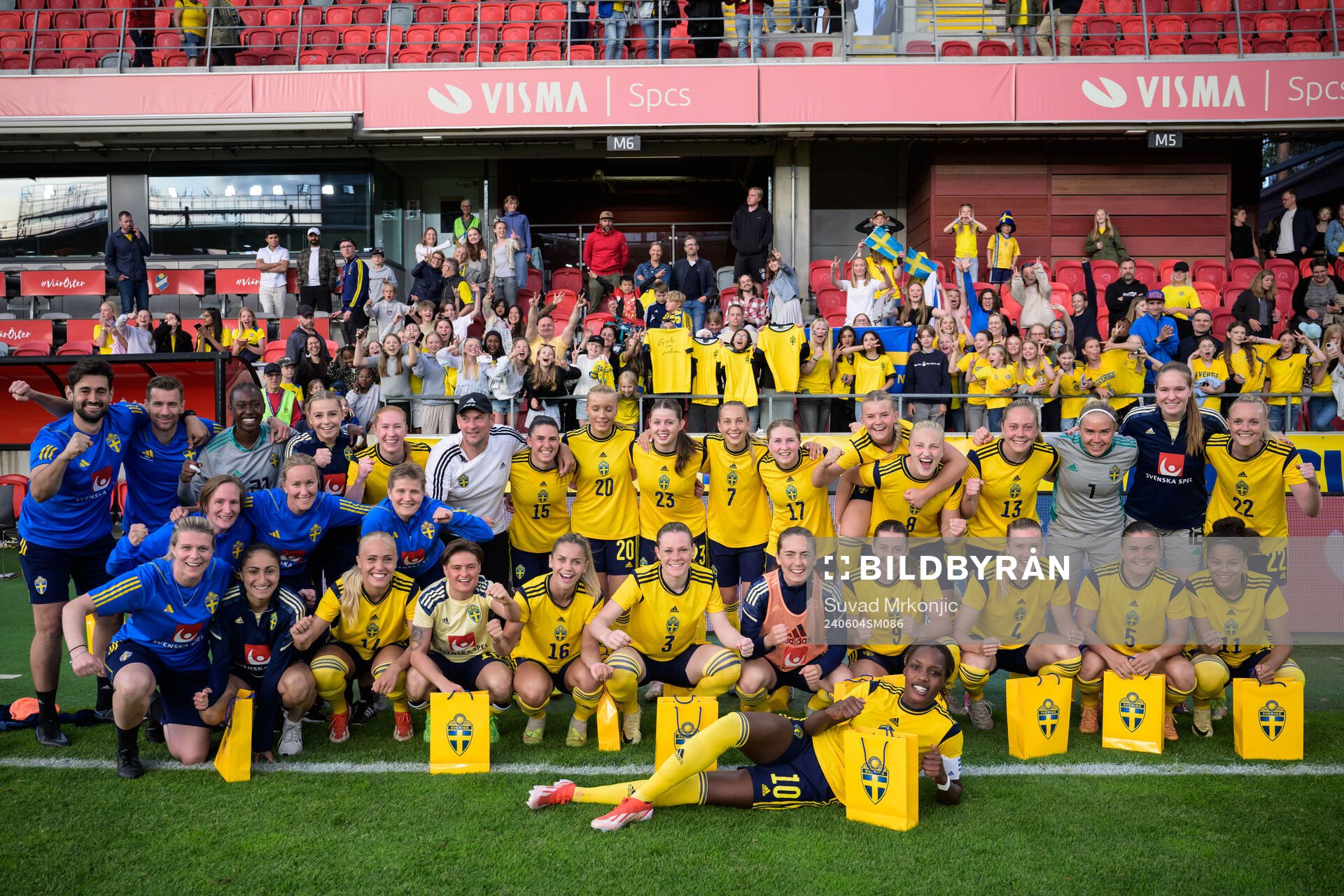 Players and staff of Sweden celebrate