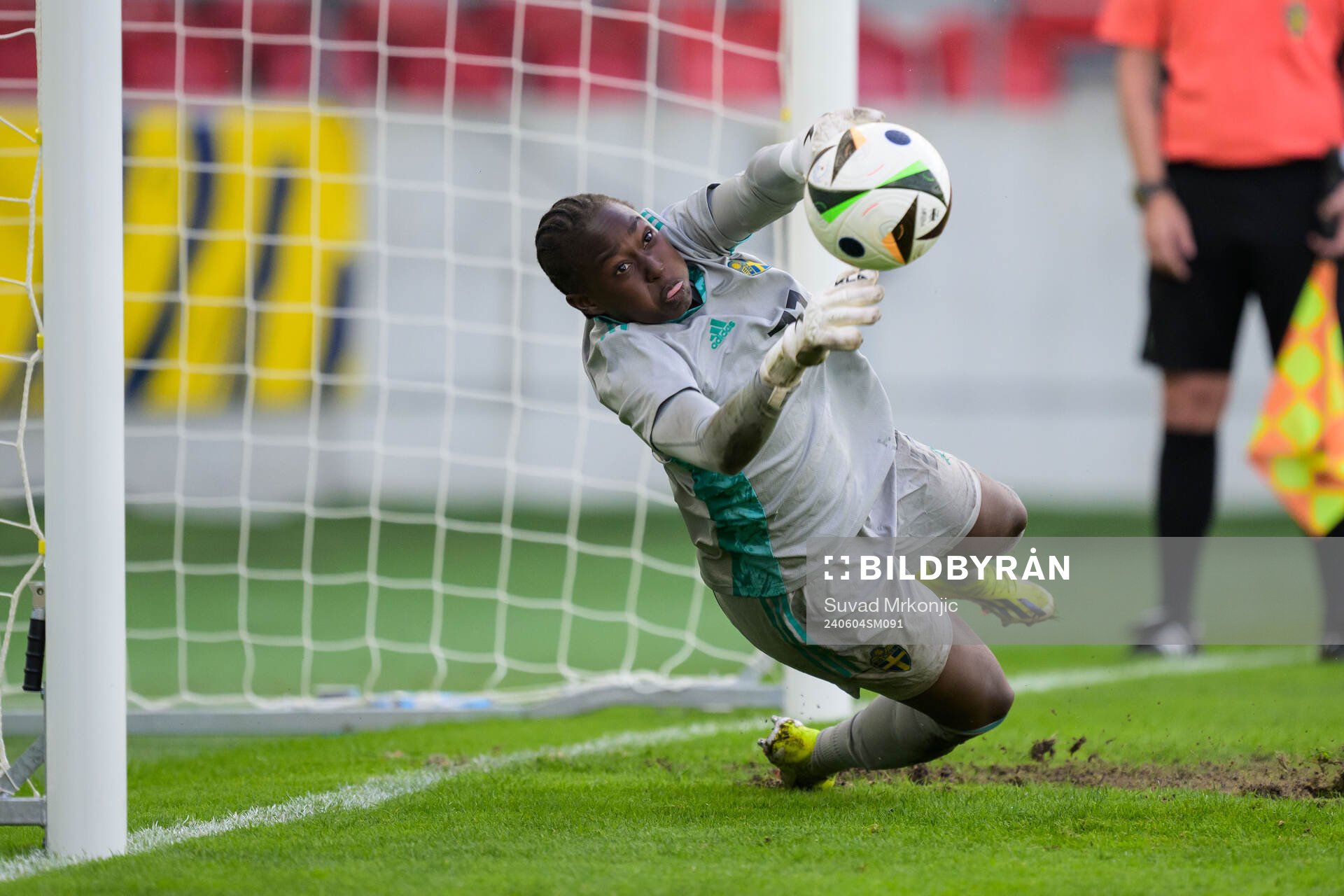 Goalkeeper Angel Mukasa of Sweden is saving a penalty