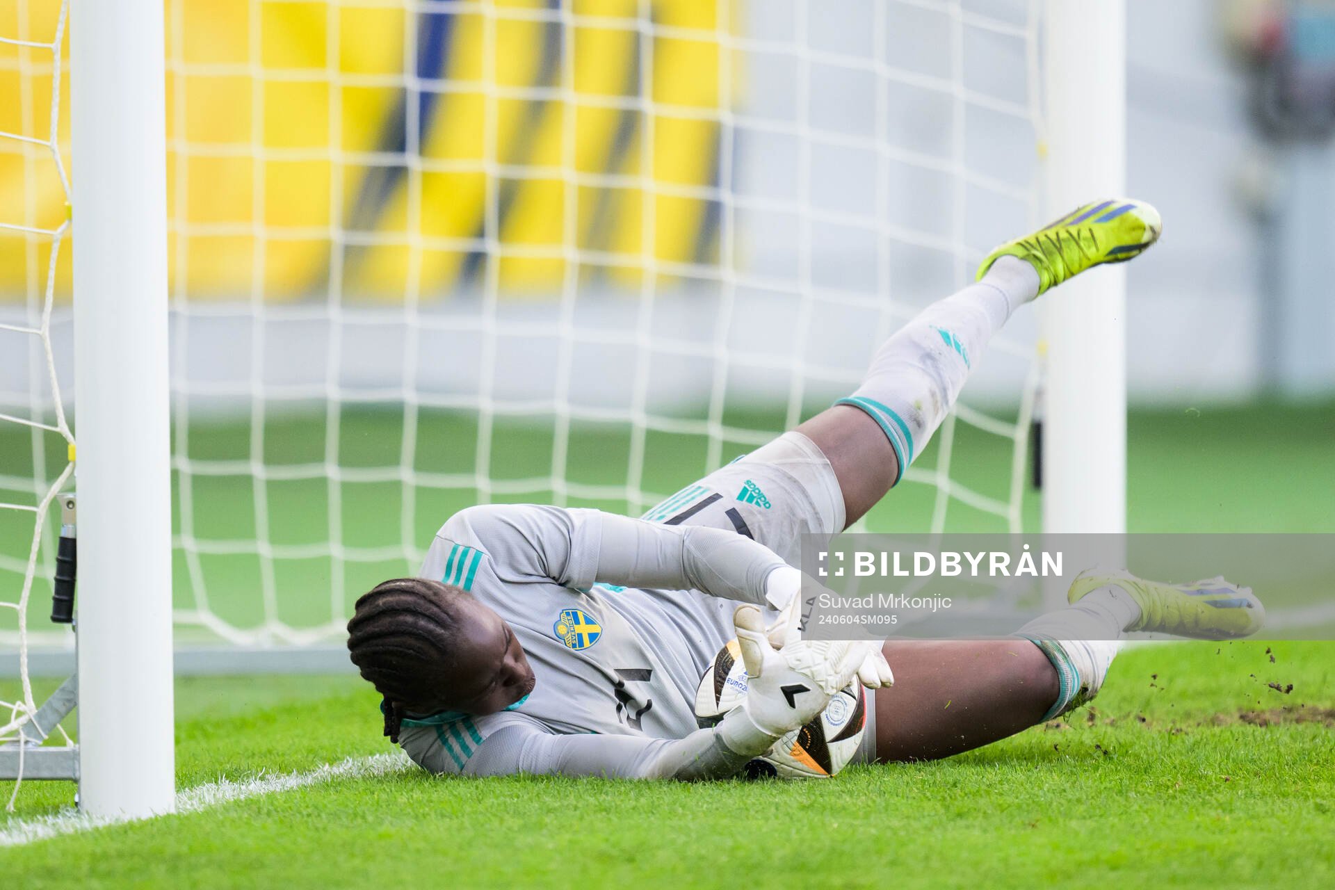 Goalkeeper Angel Mukasa of Sweden is saving a penalty