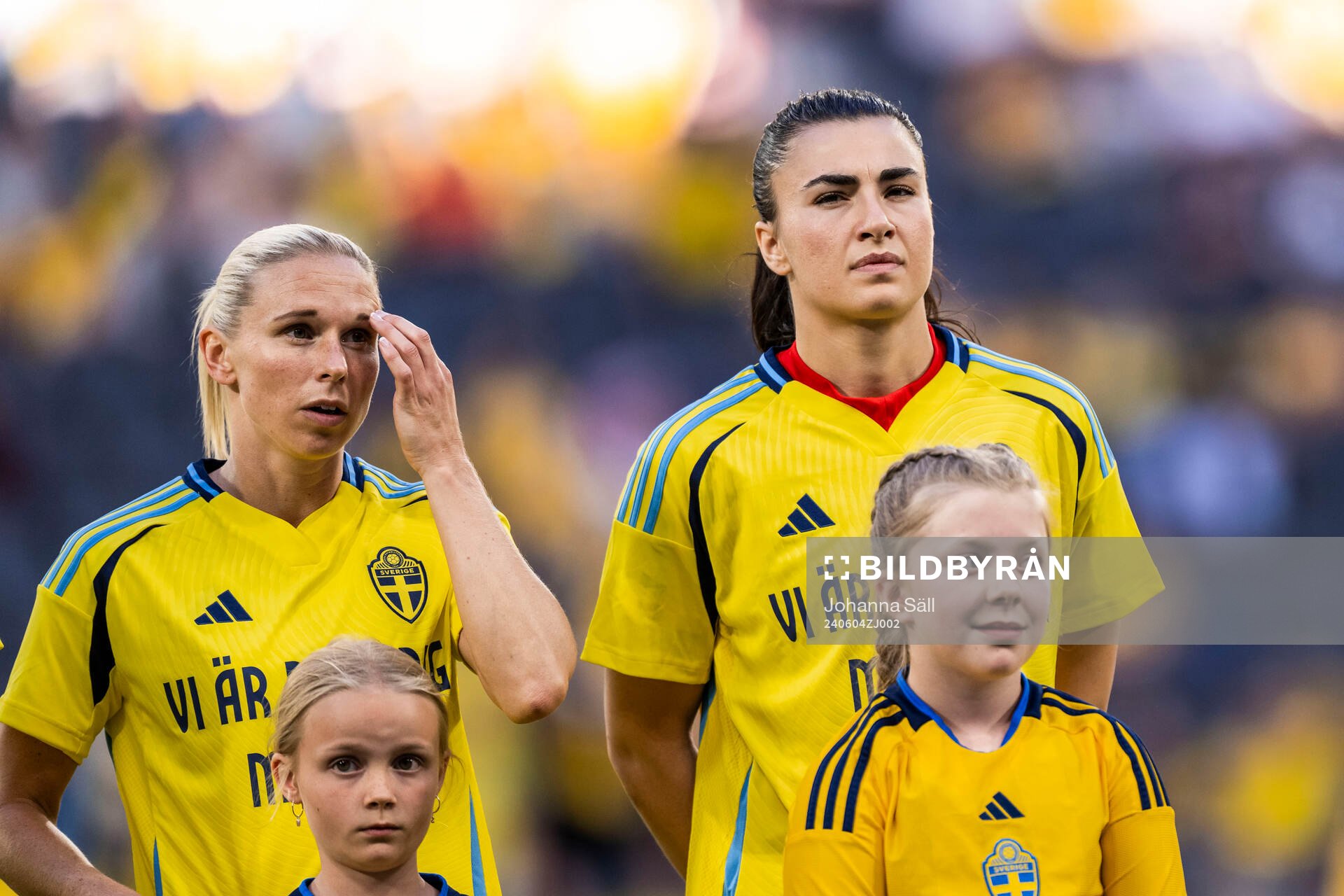 Jonna Andersson and goalkeeper Zecira Musovic of Sweden