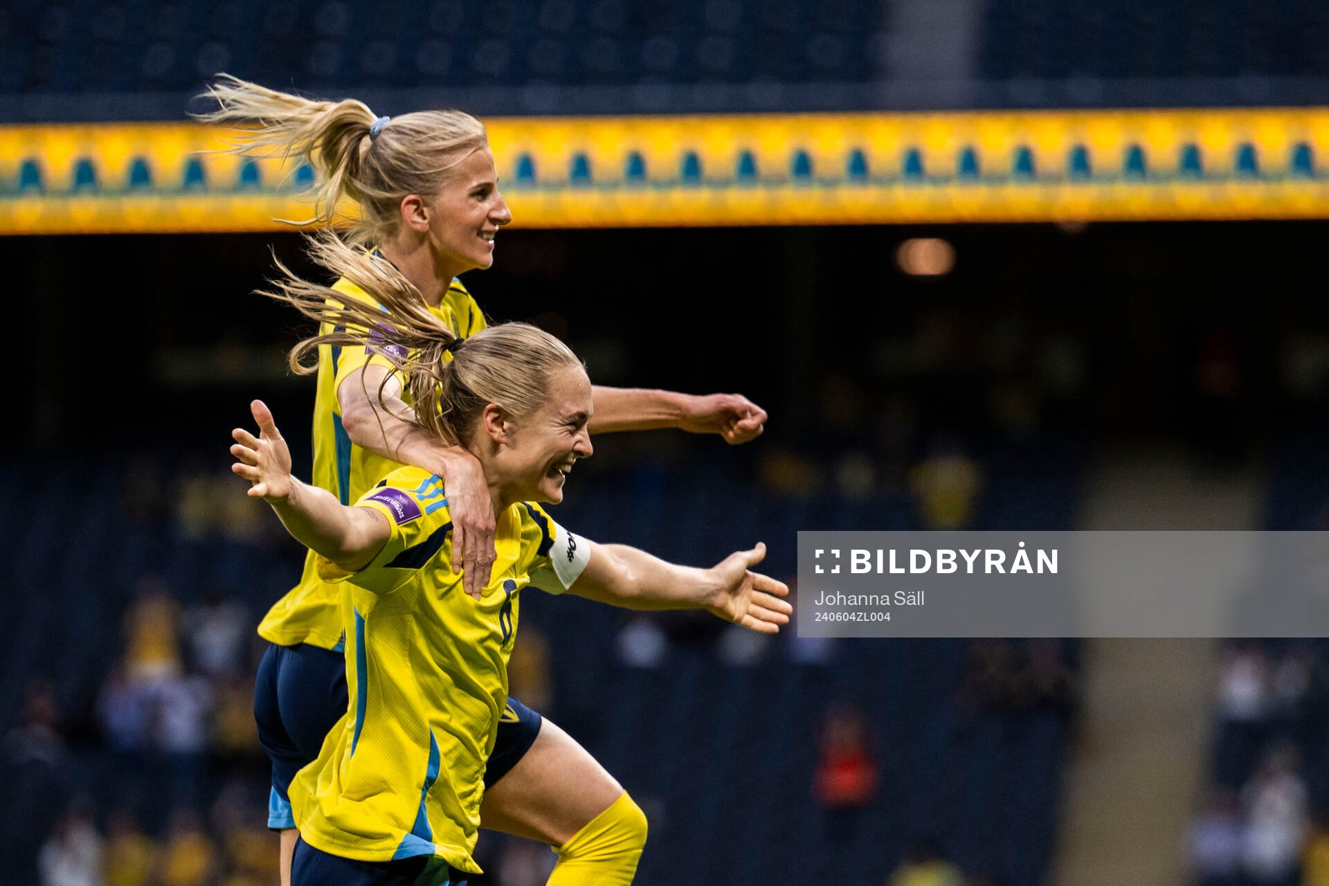 Sofia Jakobsson and Magdalena Eriksson of Sweden celebrate