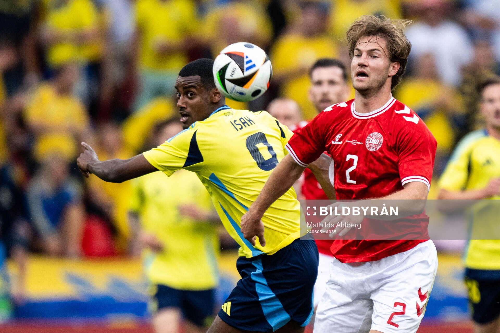 Alexander Isak of Sweden and Joachim Andersen of Denmark