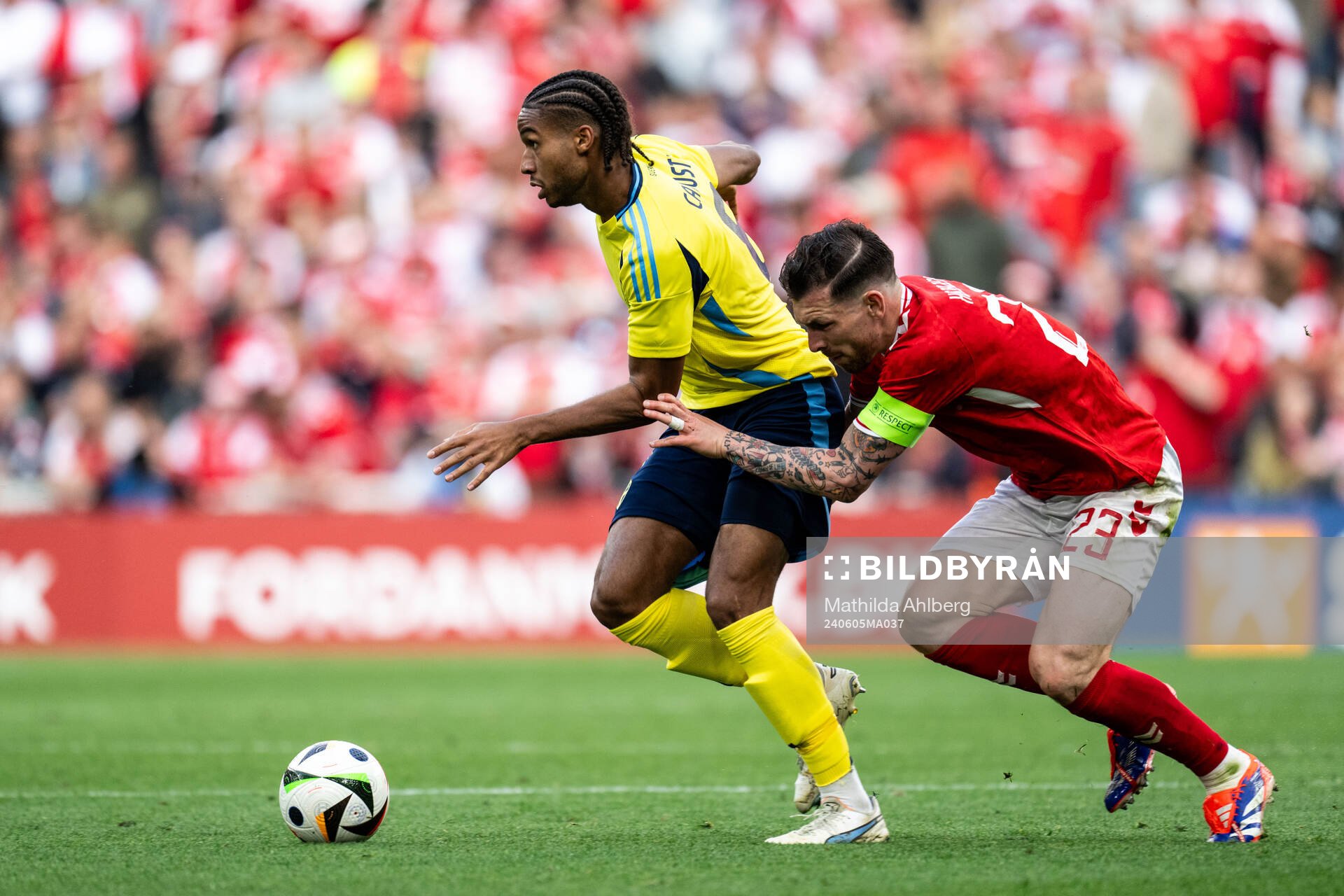 Jens-Lys Michel Cajuste of Sweden and Pierre-Emile