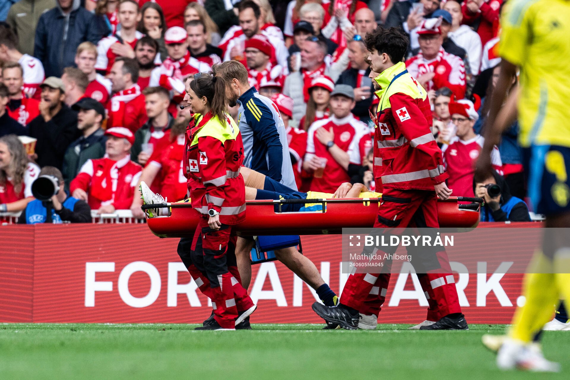 Hjalmar Ekdal of Sweden in carried out injured
