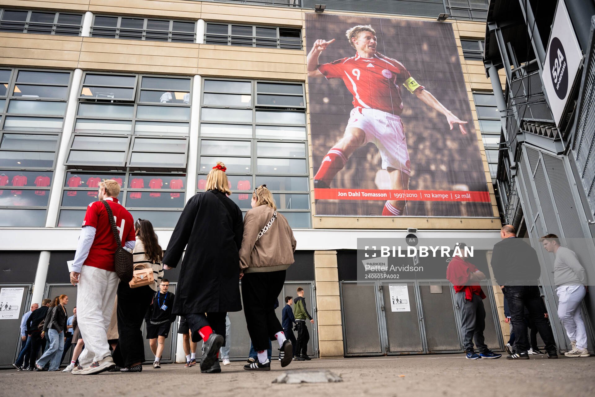 A poster of Jon Dahl Tomasson outside of Parken