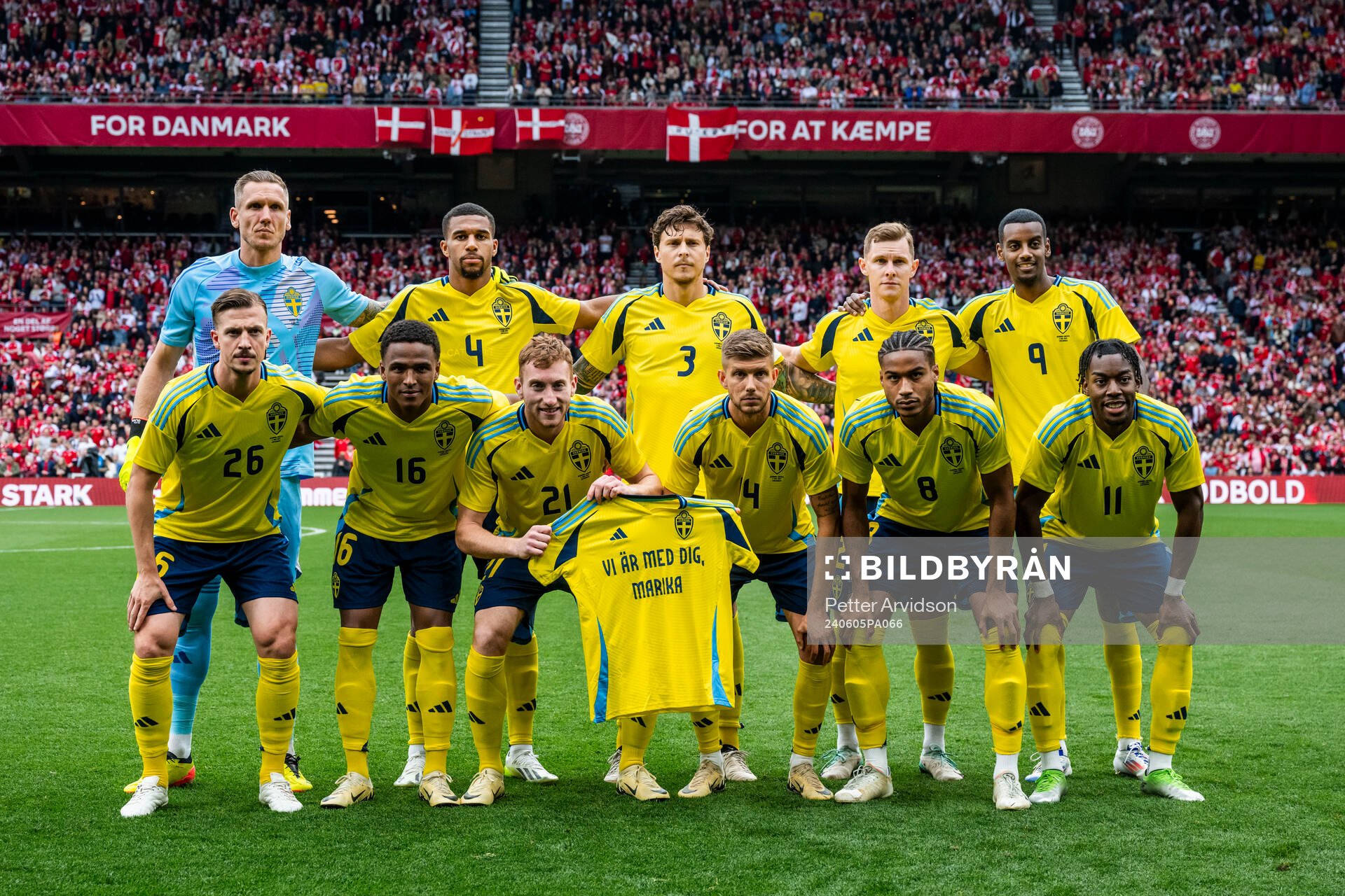 Players of Sweden line up for a team photo with a shirt