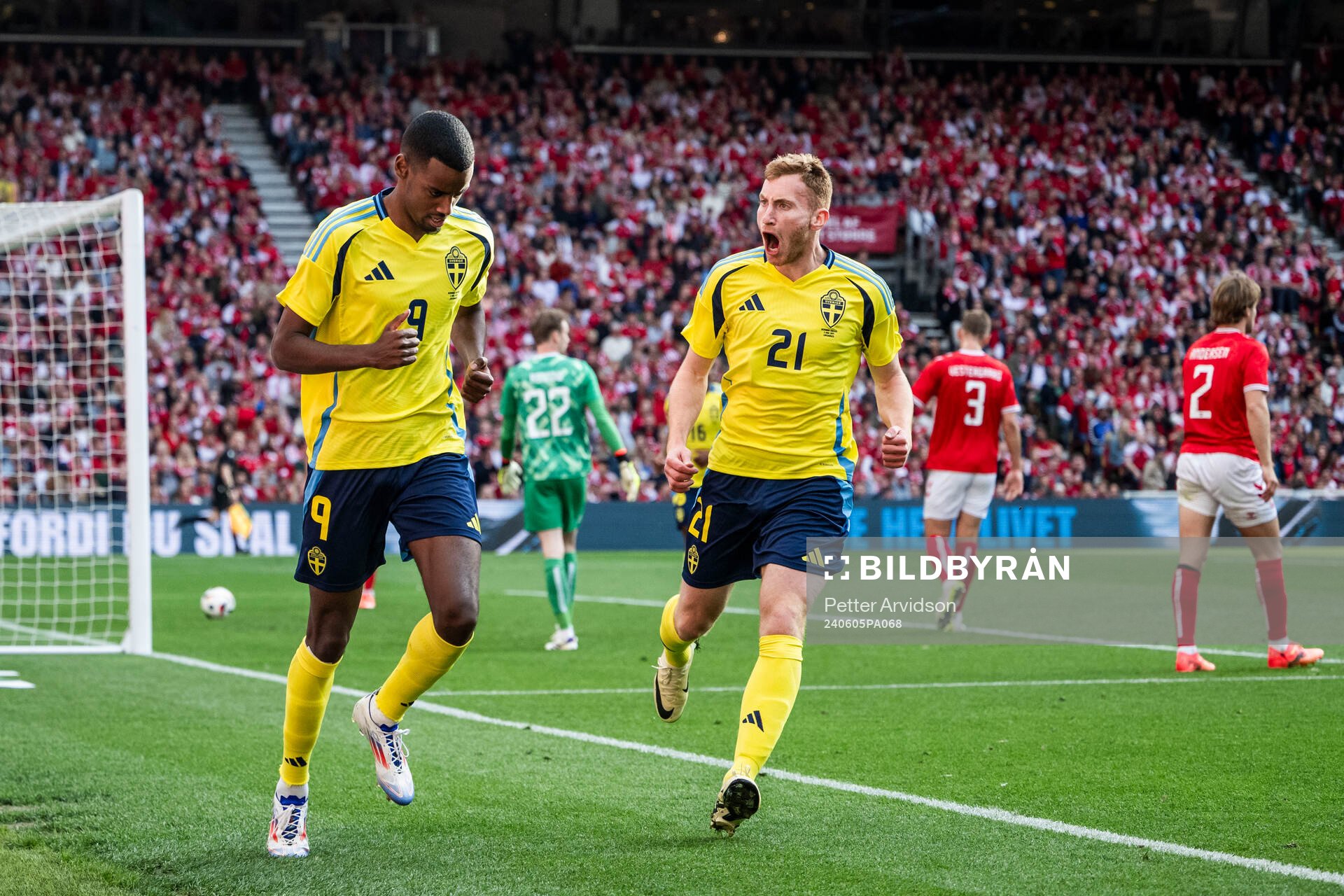 Alexander Isak and Dejan Kulusevski of Sweden celebrate