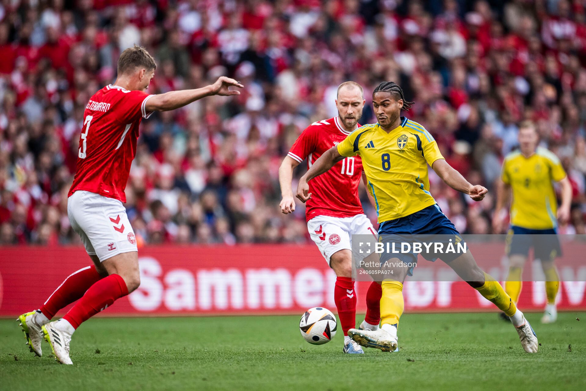 Christian Eriksen of Denmark and Jens-Lys Michel Cajuste of