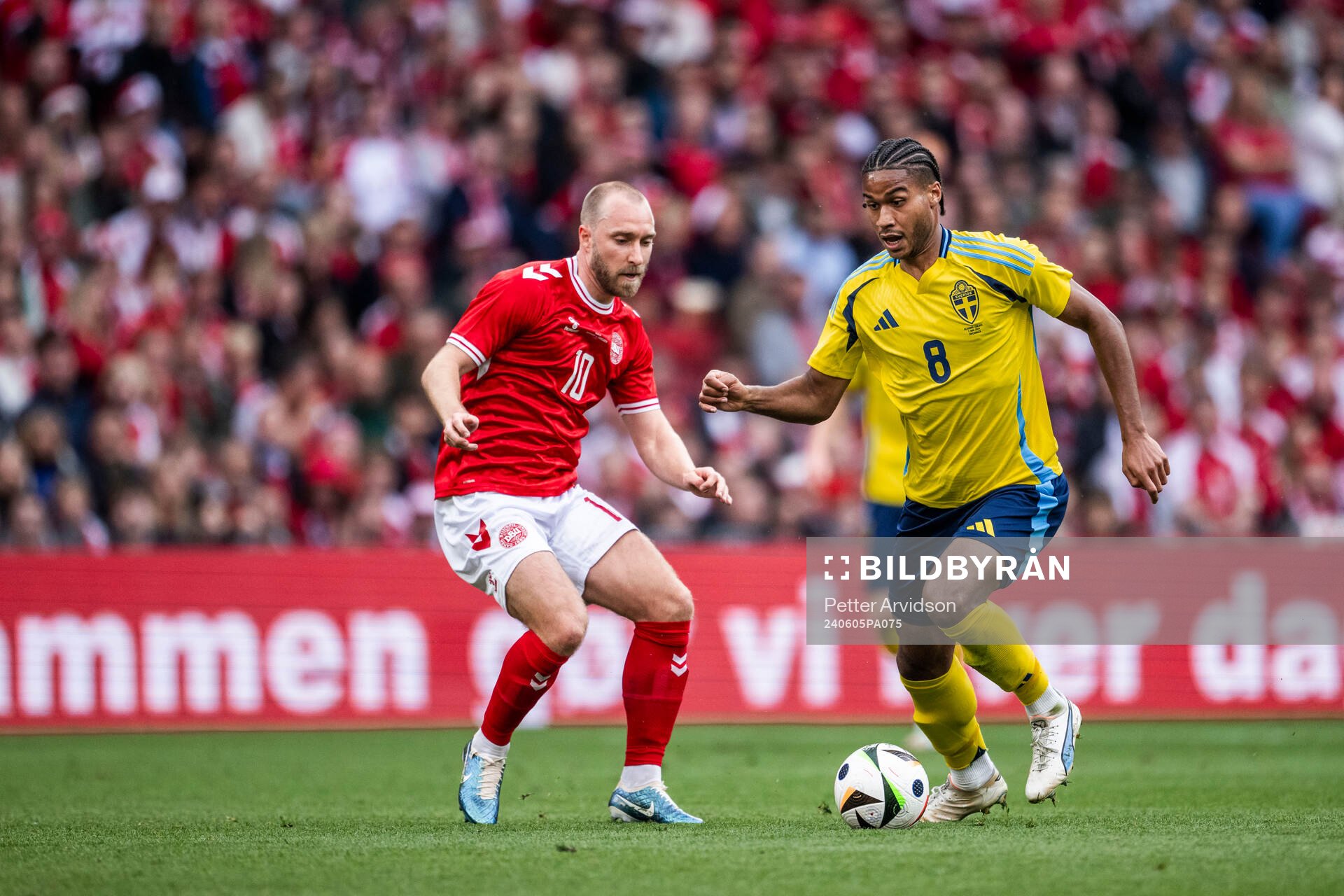 Christian Eriksen of Denmark and Jens-Lys Michel Cajuste of