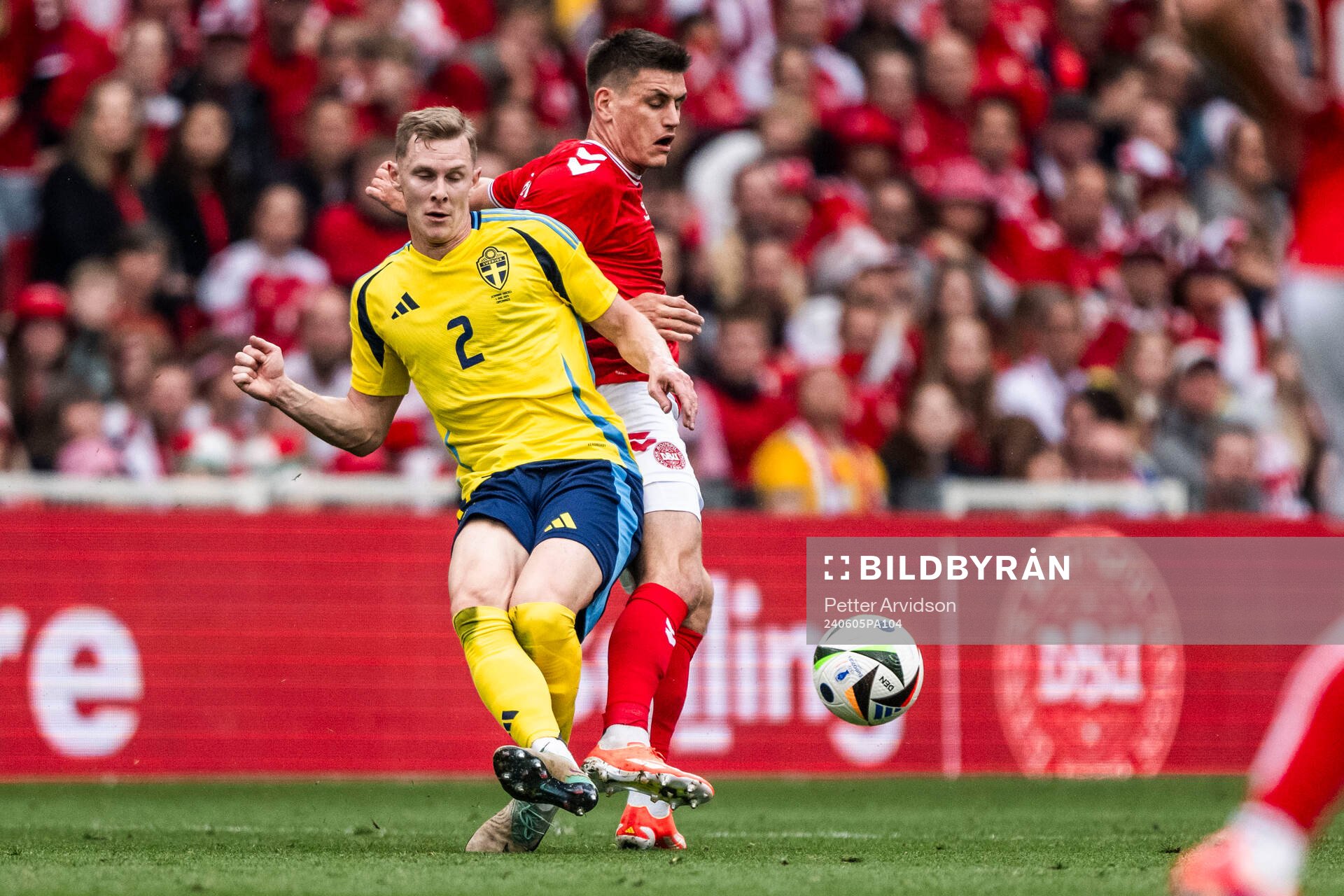 Emil Krafth of Sweden and Joakim Mæhle of Denmark