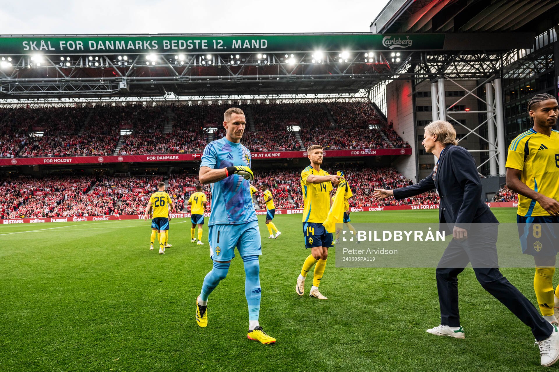 goalkeeper Robin Olsen and Anton Salétros of Sweden