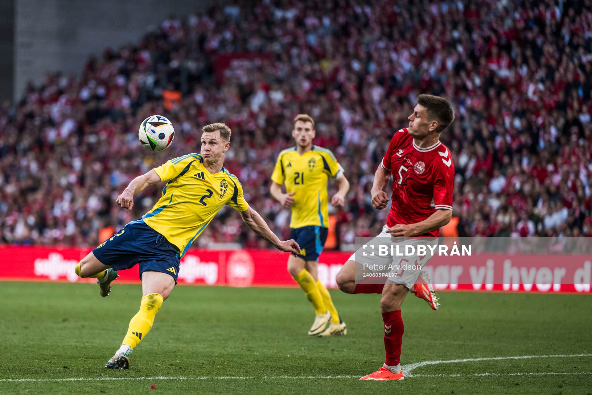 Emil Krafth of Sweden and Joakim Mæhle of Denmark