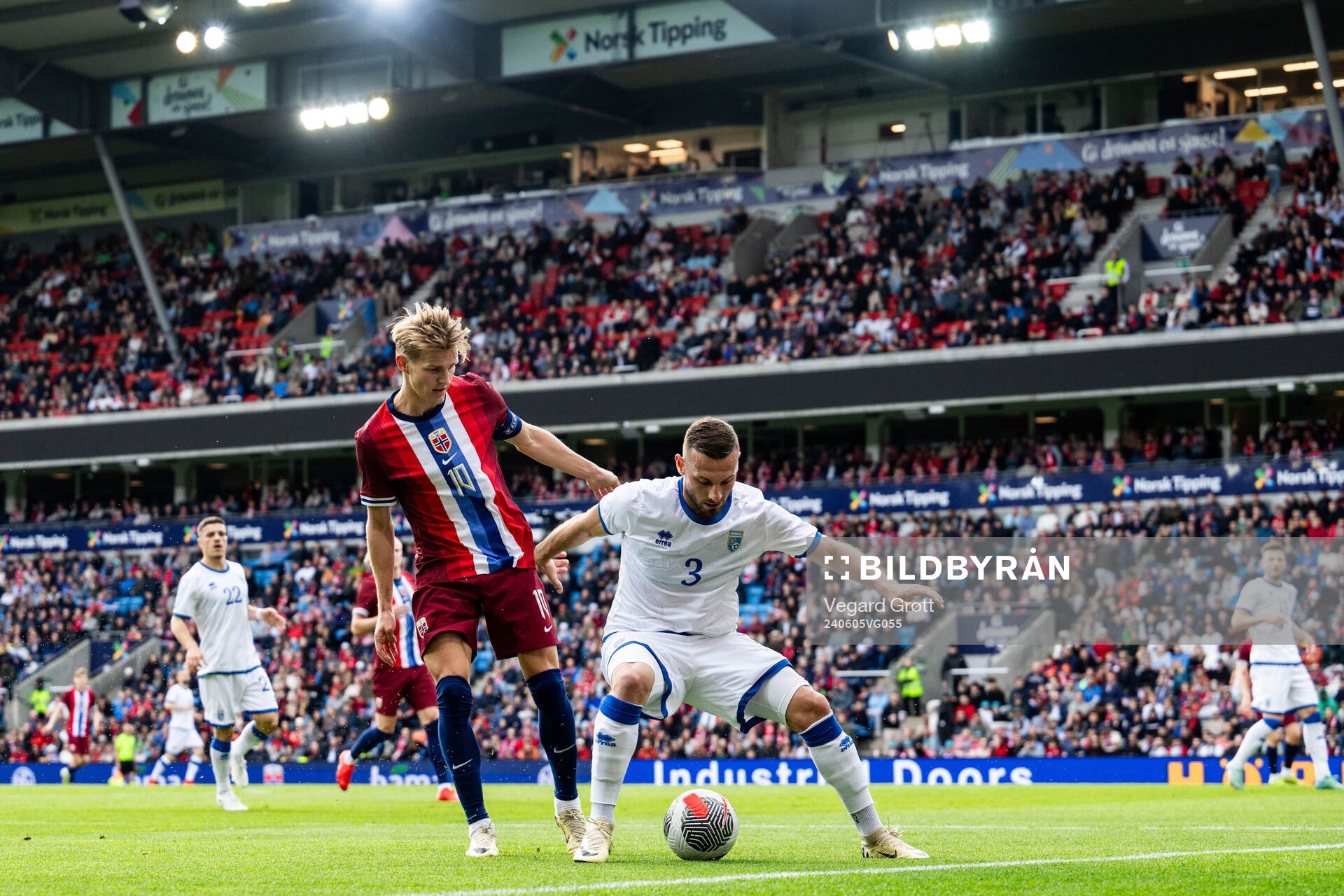 Martin Ødegaard of Norway and Fidan Aliti of Kosovo