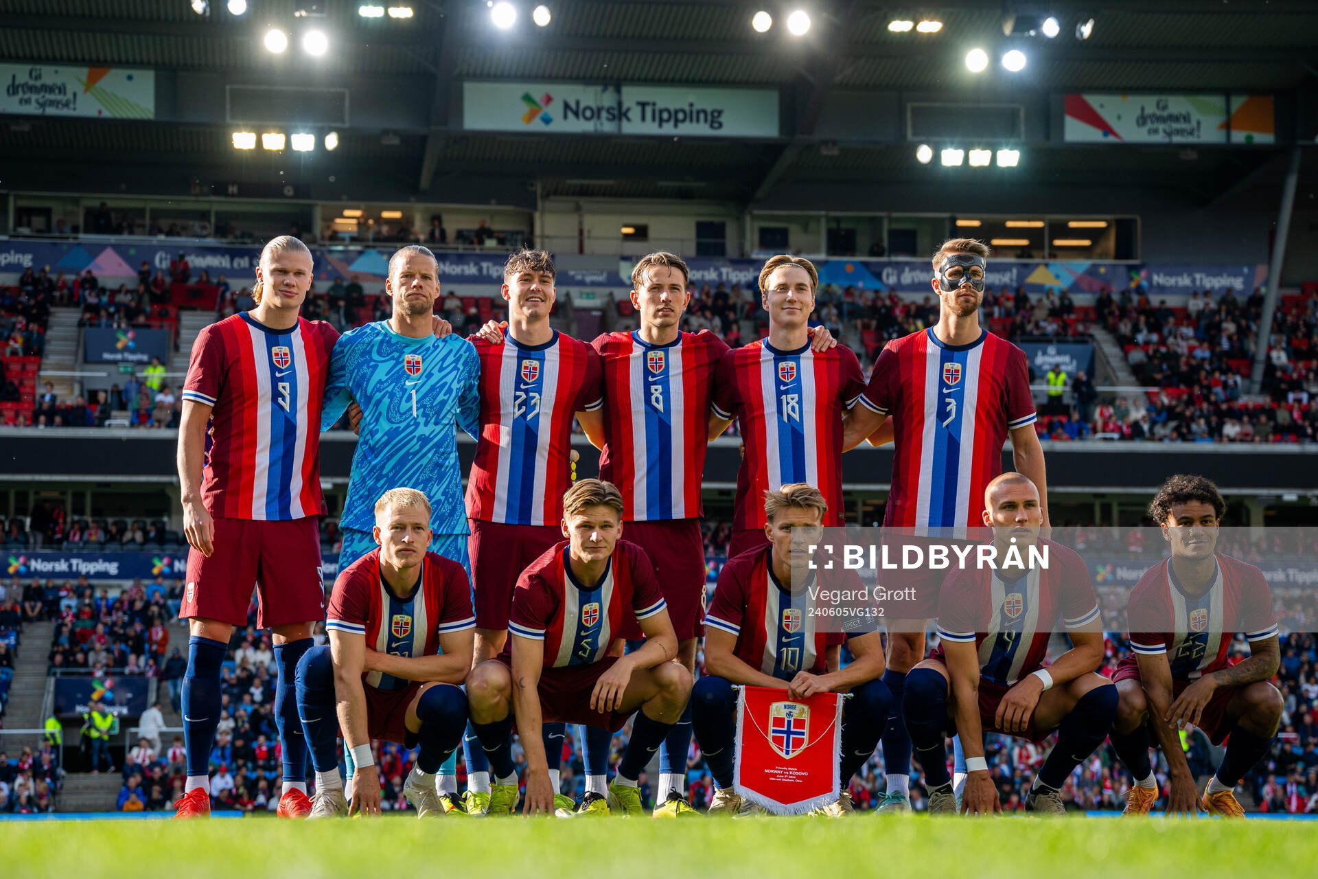 The starting eleven of Norway pose for a team photo ahead of the international friendly football match between Norway and Kosovo on June 5, 2024 in Oslo. Top left: Erling Braut Haaland, goalkeeper Ørjan Håskjold Nyland, Jørgen Strand Larsen, Sander Berge, Kristian Thorstvedt and Kristoffer Ajer. Front left: Andreas Hanche-Olsen, David Møller Wolfe, Martin Ødegaard, Leo Skiri Østigård and Oscar Bobb.