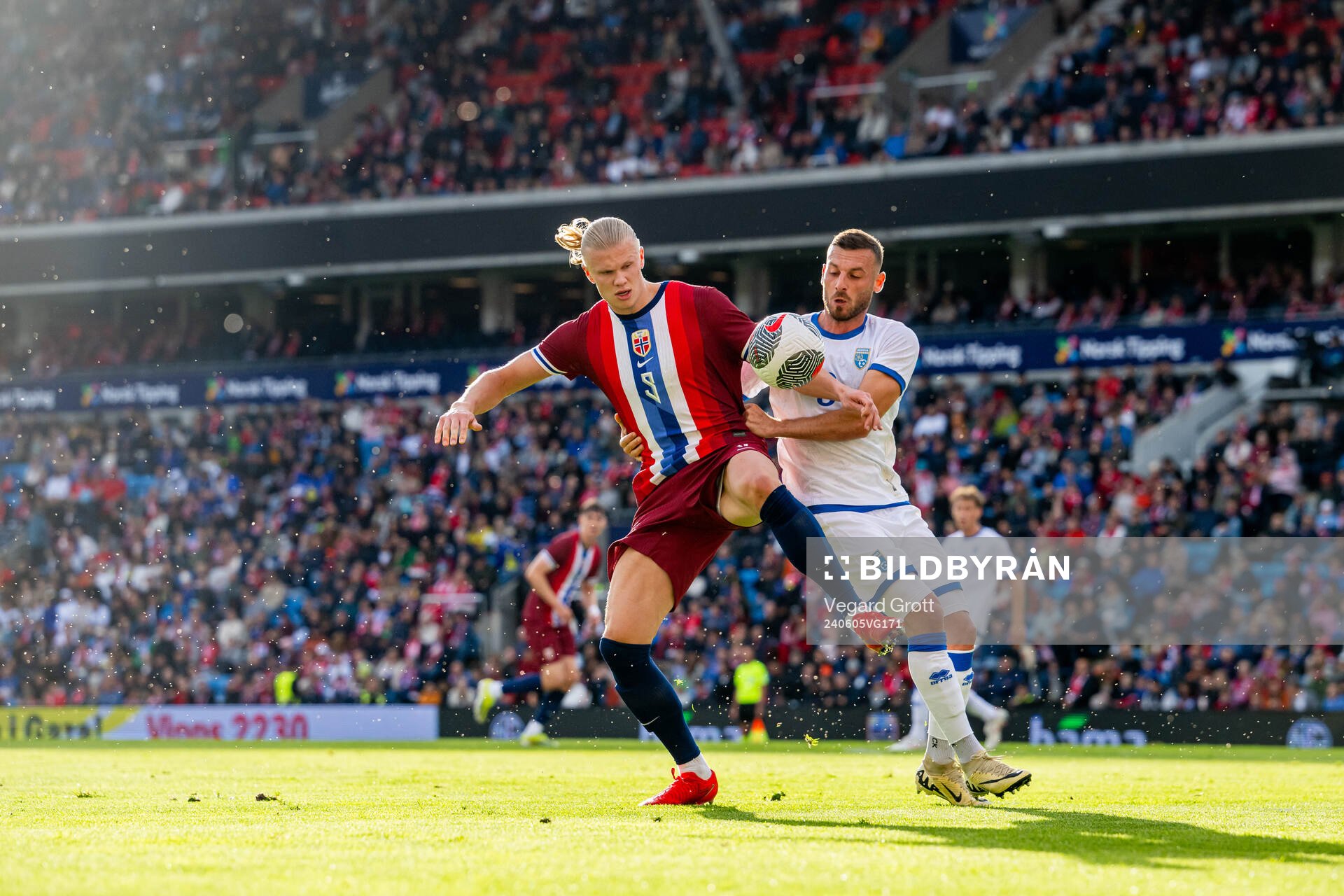 Erling Braut Haaland of Norway and Fidan Aliti of Kosovo