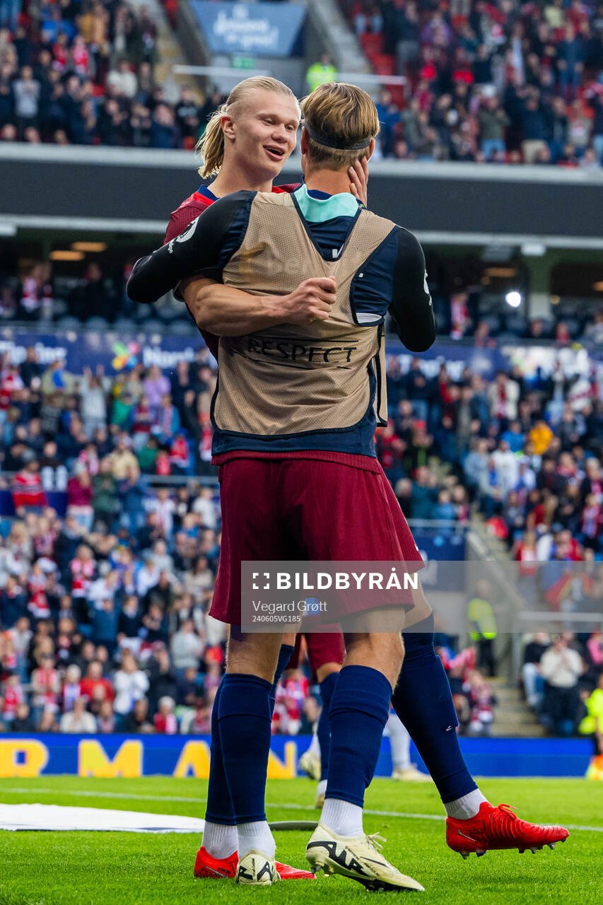 Erling Braut Haaland of Norway celebrates with teammate