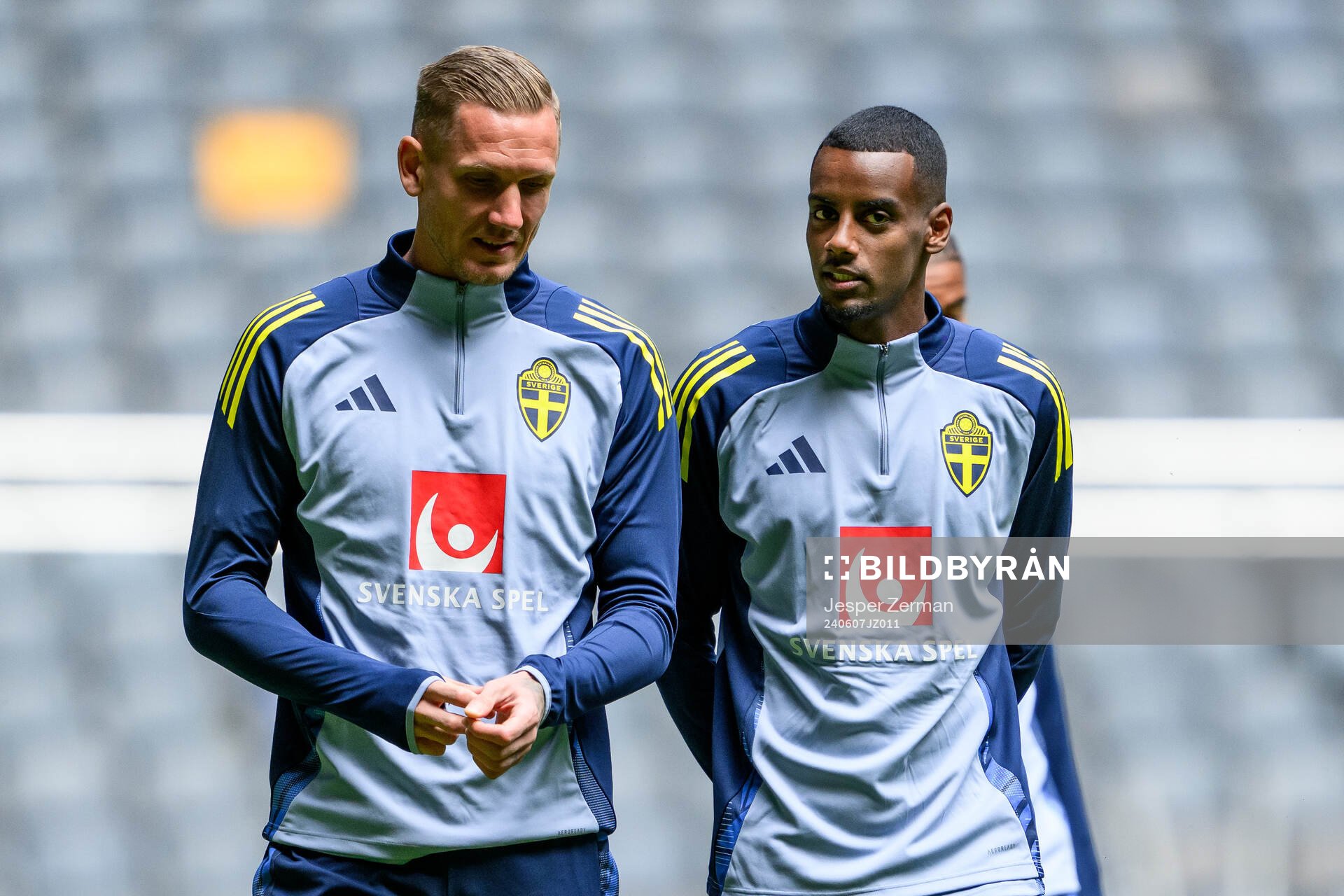 goalkeeper Robin Olsen and Alexander Isak of the Swedish