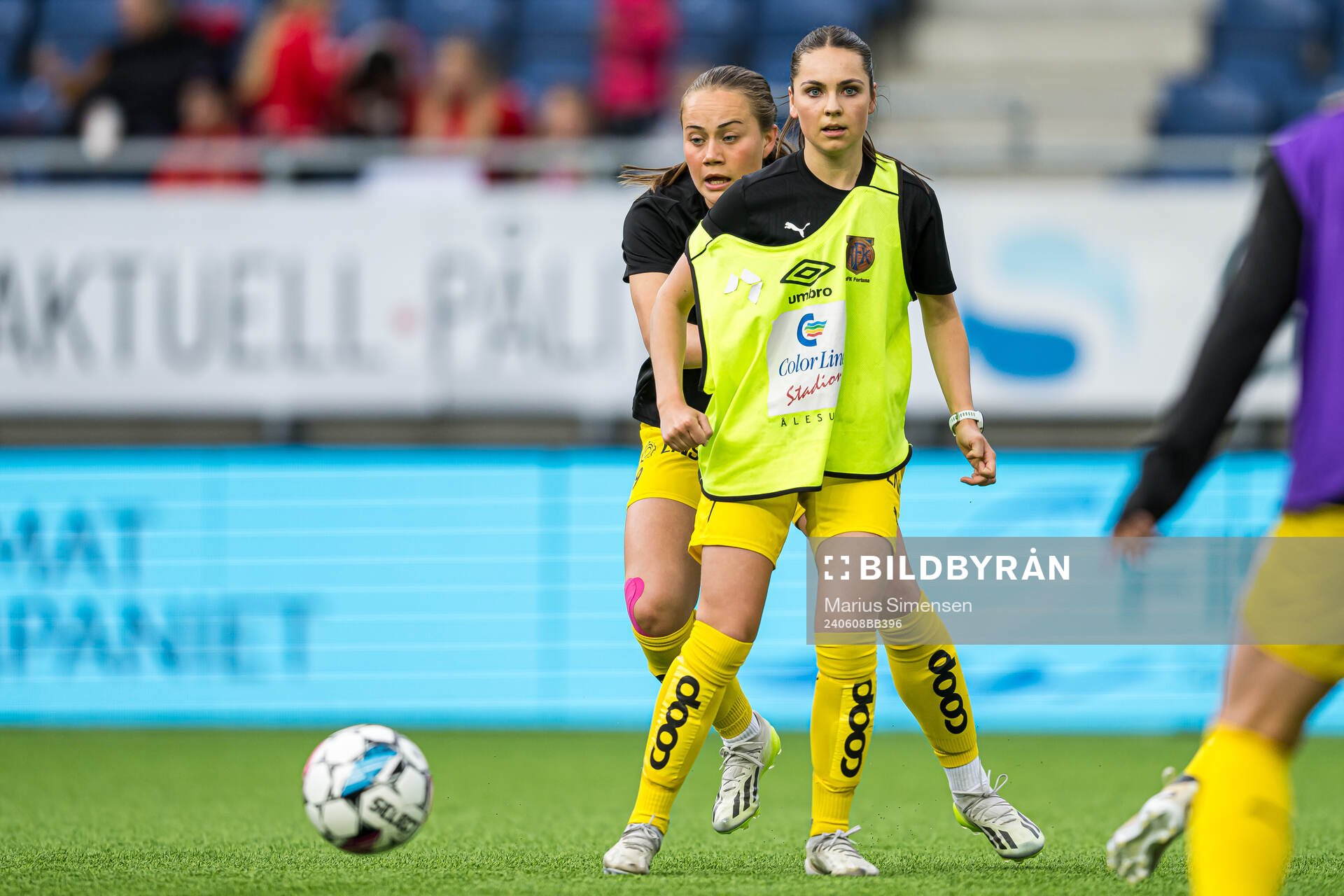 Lise Højsted Dissing and Helene Rædergård Schjelderup of Bodø/Glimt warms up ahead of the 1. division football match between AaFK Fortuna and Bodø/Glimt on June 8, 2024 in Ålesund.