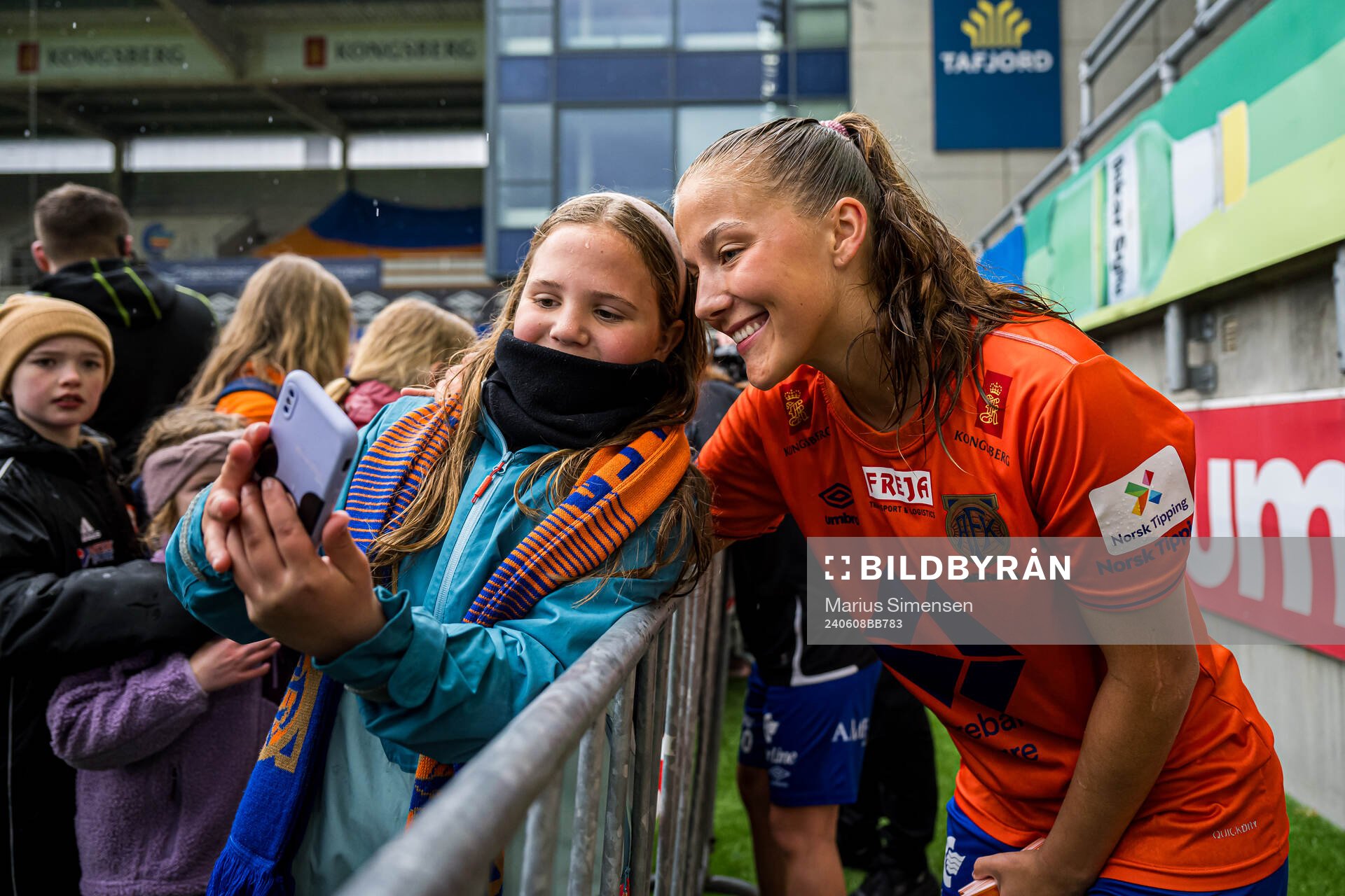 Hanna Bråten Gravem of AaFK Fortuna taking a selfie with a fan after the 1. division football match between AaFK Fortuna and Bodø/Glimt on June 8, 2024 in Ålesund.