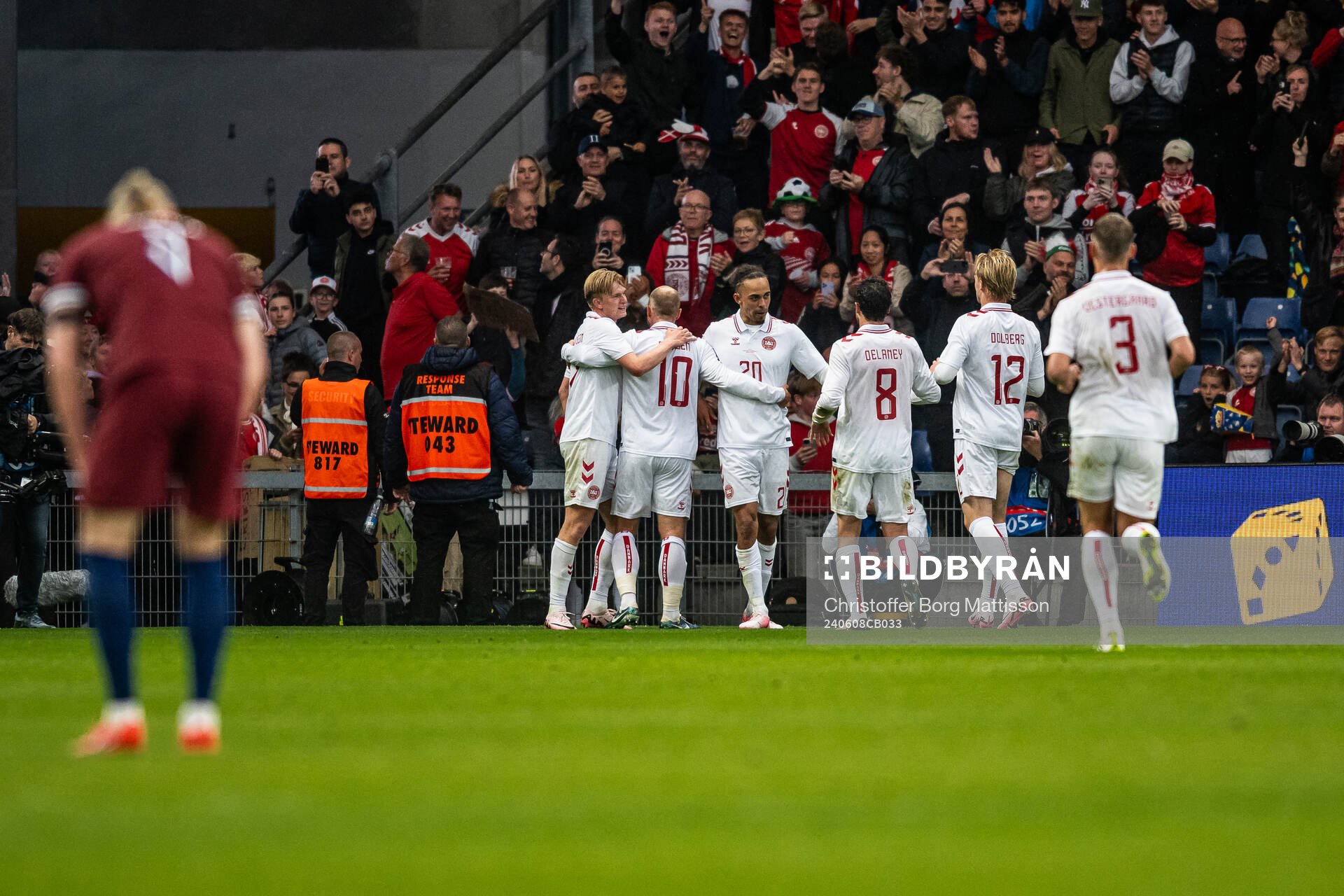 Yussuf Poulsen of Denmark celebrate with teammates