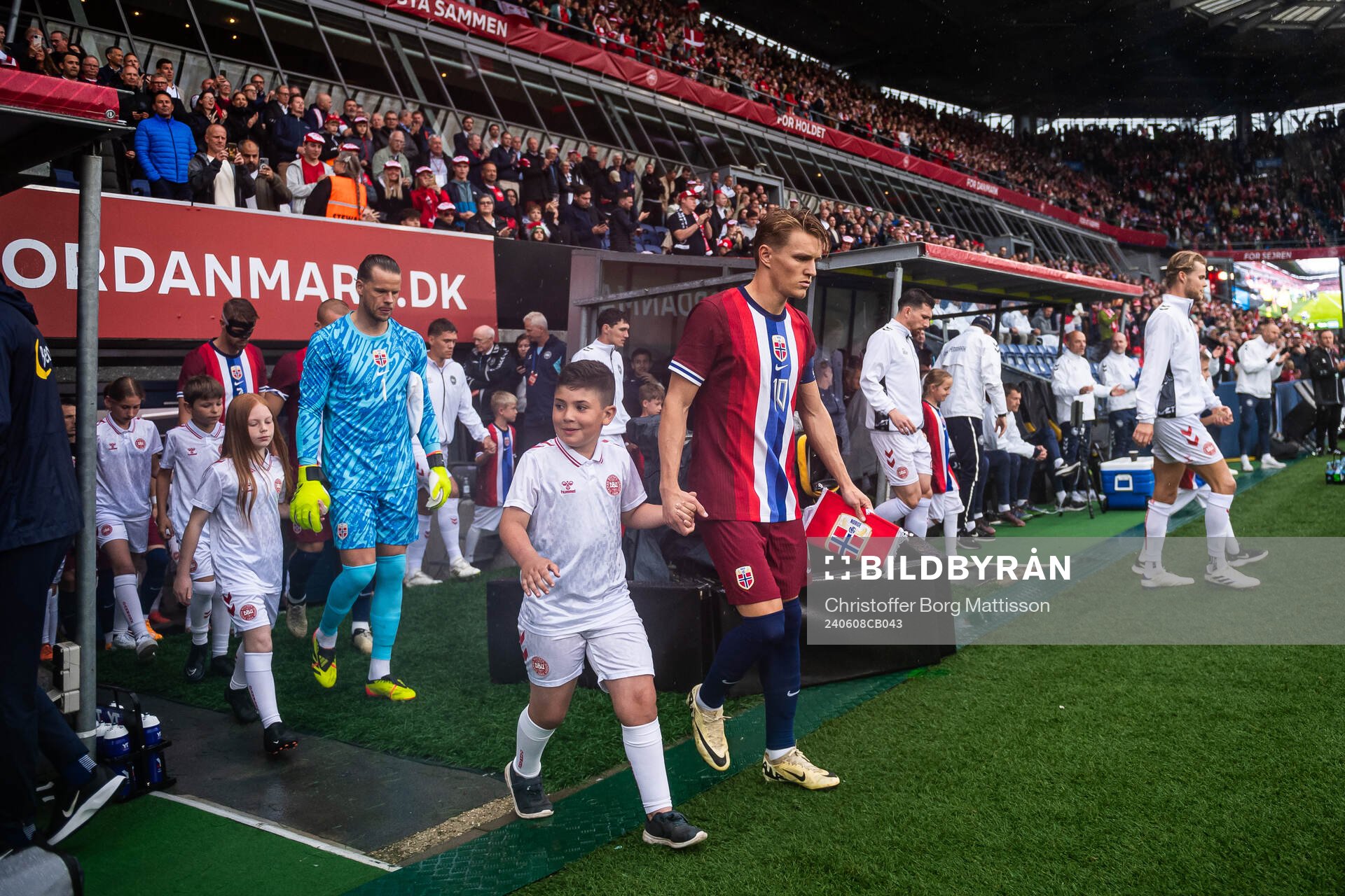 Martin Ødegaard and goalkeeper Ørjan Håskjold Nyland of