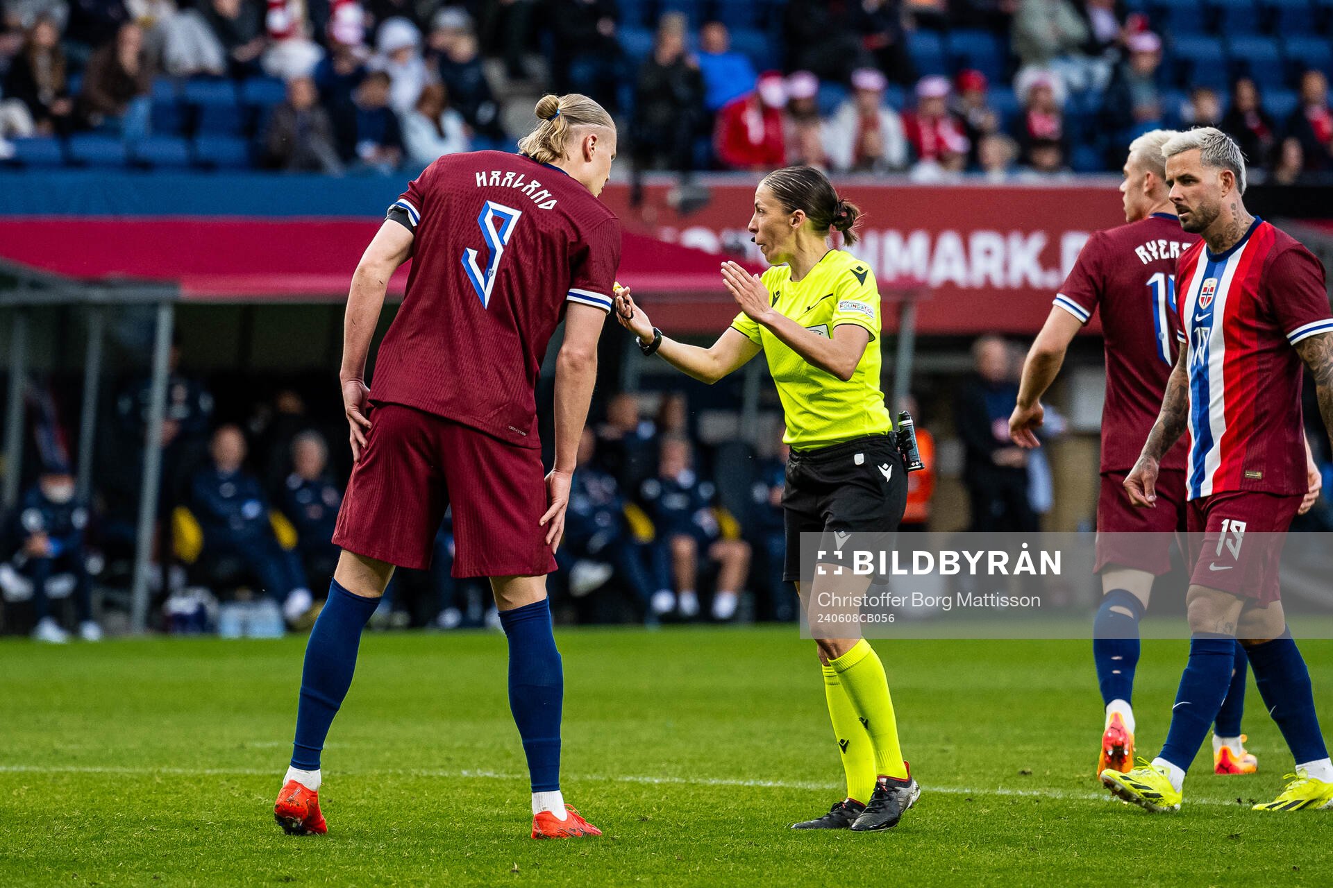 Erling Braut Haaland of Norway and referee Stéphanie Frappart during the international friendly football match between Denmark and Norway on June 8, 2024 in Brøndby.