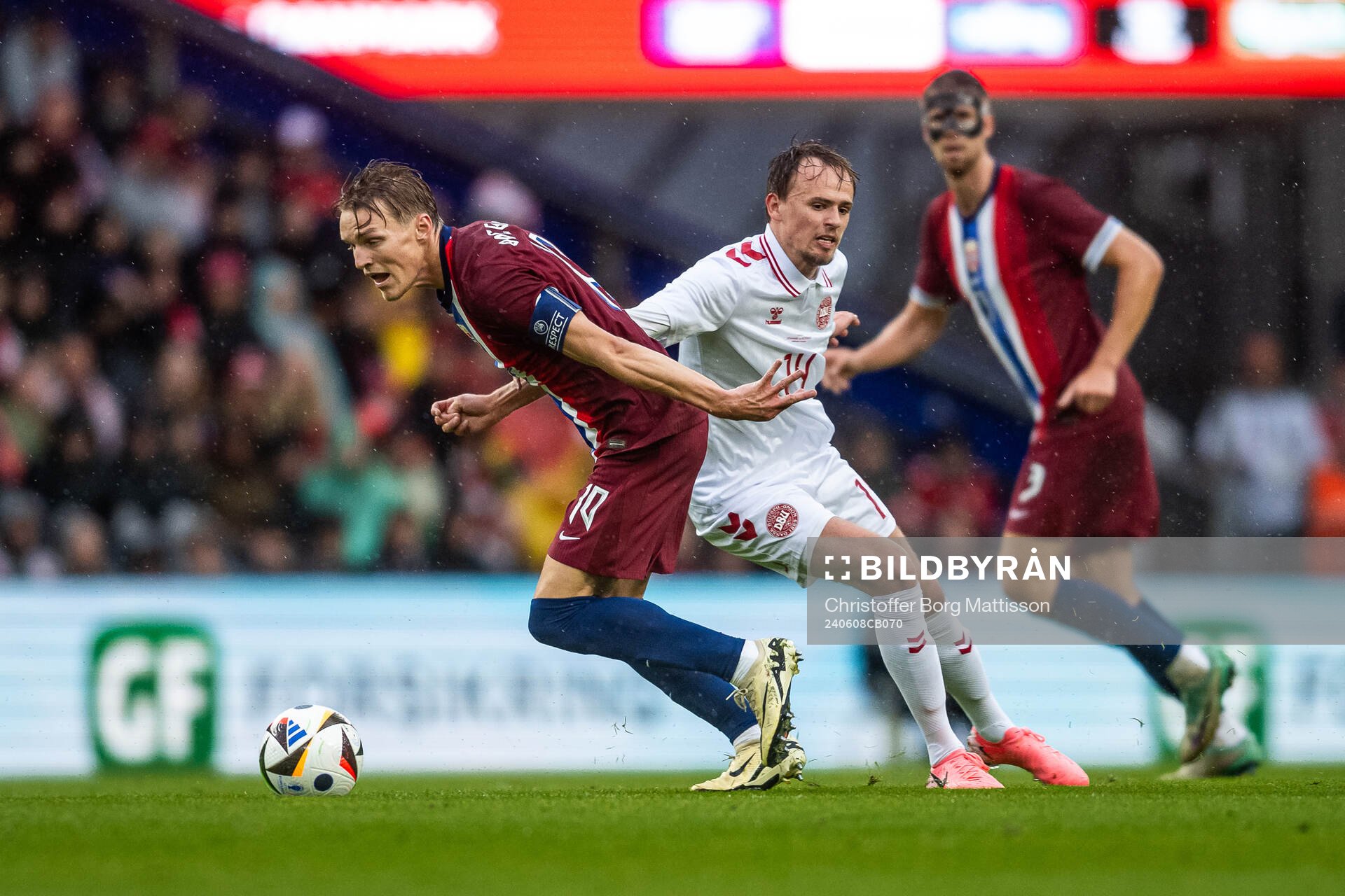 Martin Ødegaard of Norway and Mikkel Damsgaard of Denmark