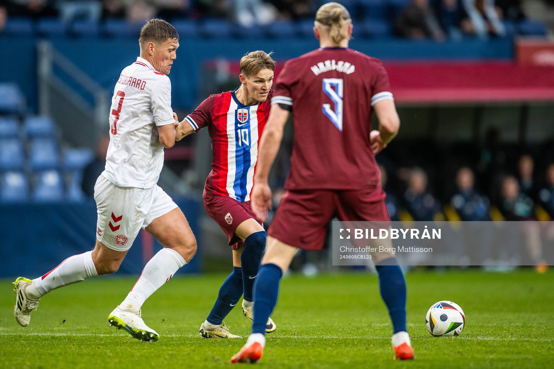 Jannik Vestergaard of Denmark and Martin Ødegaard of Norway