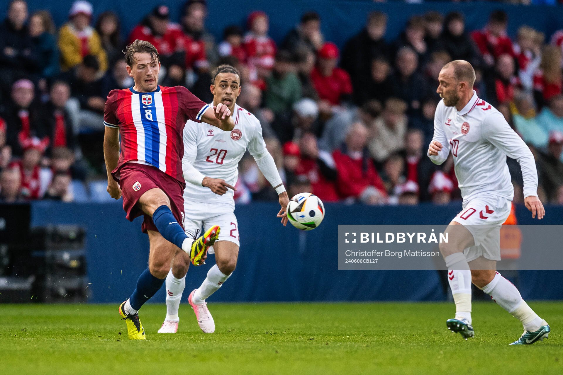 Sander Berge of Norway and Yussuf Poulsen and Christian