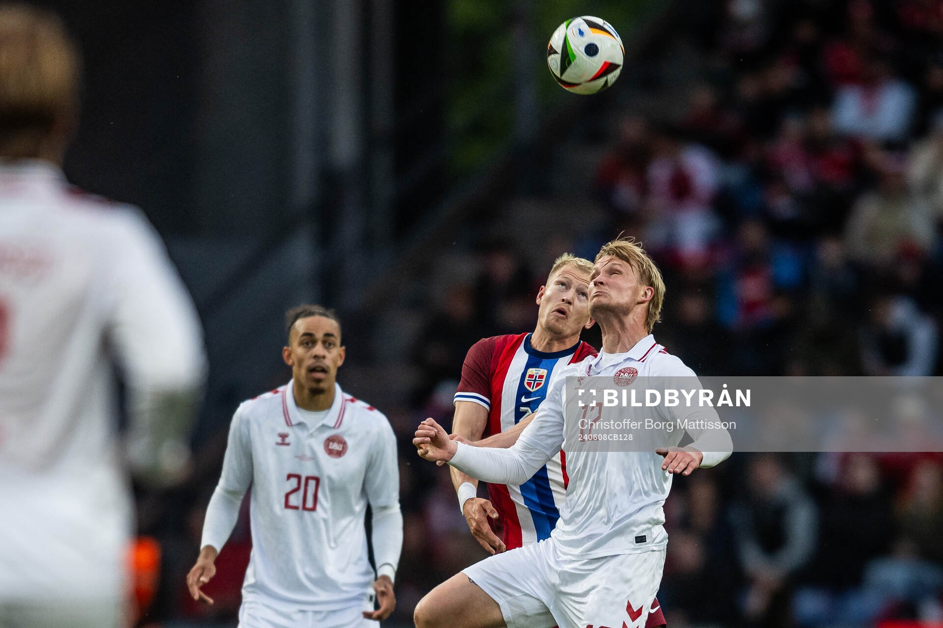 Andreas Hanche-Olsen of Norway and Kasper Dolberg of Denmark