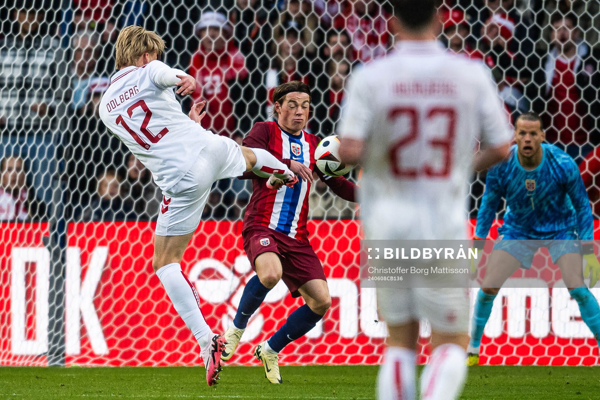 Kasper Dolberg of Denmark and Patrick Berg of Norway
