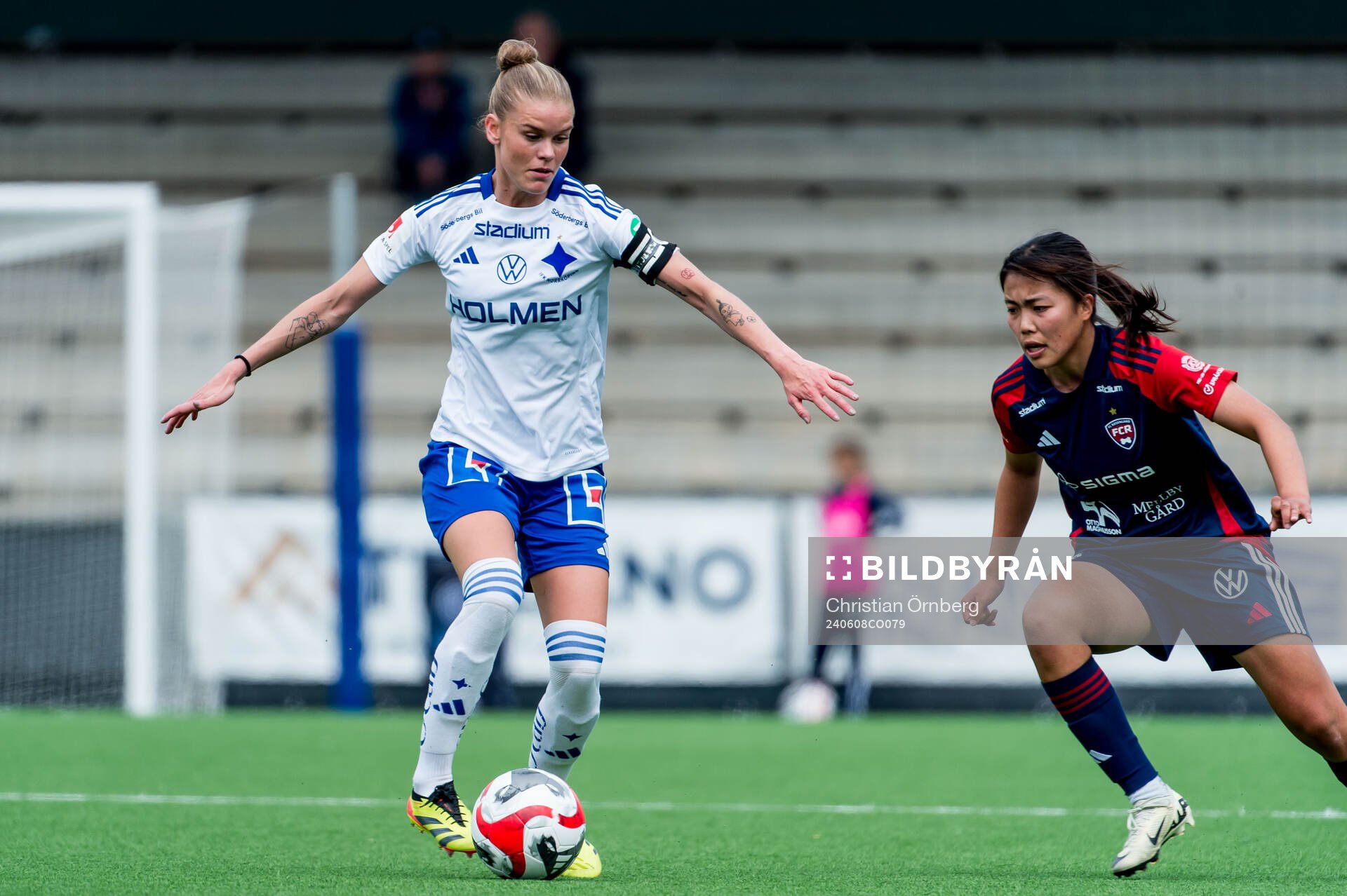 IFK Norrköpings My Cato och FC Rosengårds Momoko Tanikawa under fotbollsmatchen i Damallsvenskan mellan FC Rosengård och IFK Norrköping den 8 juni 2024 i Malmö. 