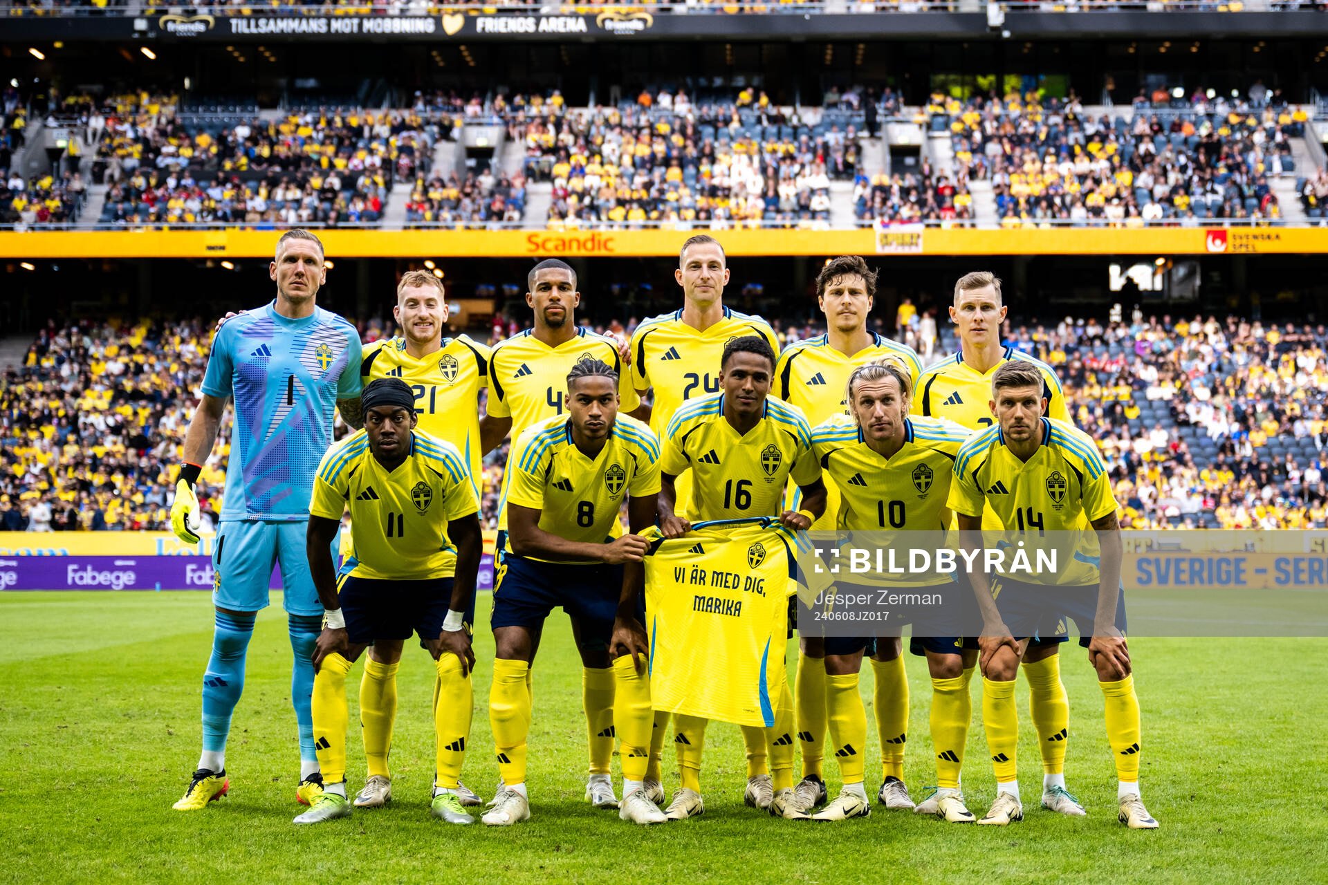 Players of Sweden line up for a team photo with a shirt