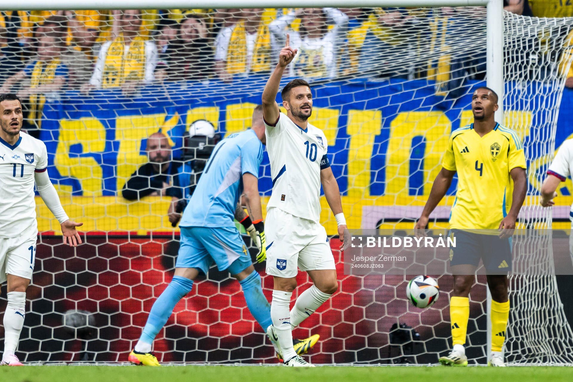 Dusan Tadic of Serbia celebrates