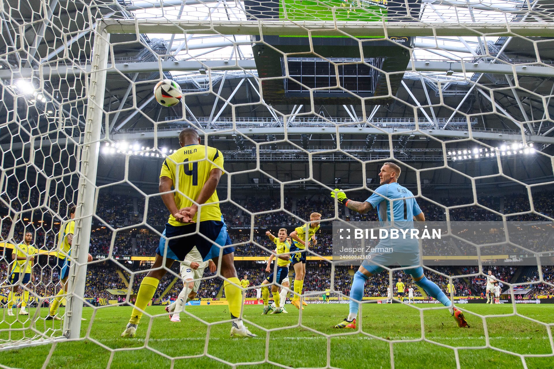 Isak Hien and goalkeeper Robin Olsen of Sweden as Dusan
