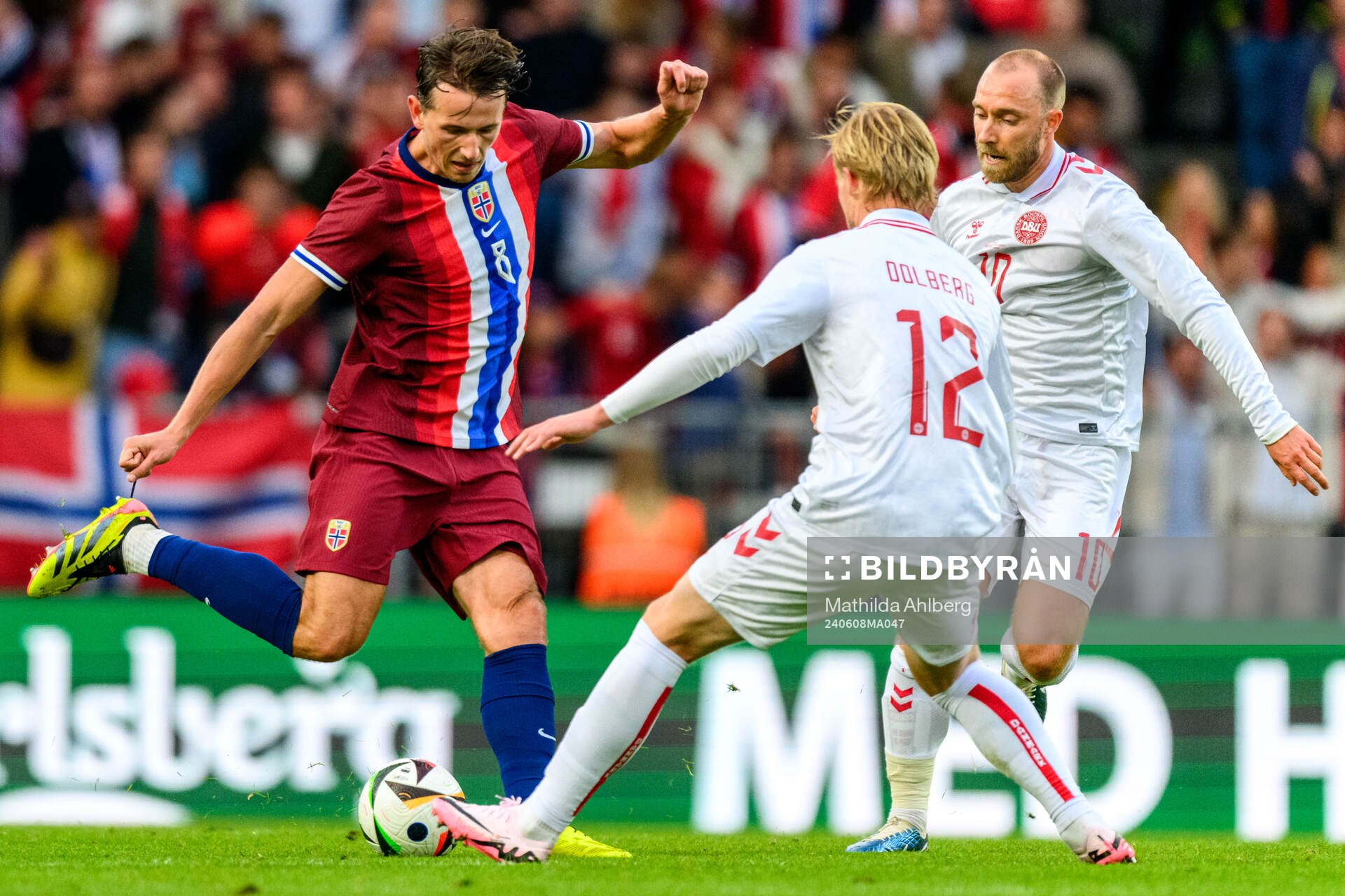 Sander Berge of Norway and Kasper Dolberg and Christian