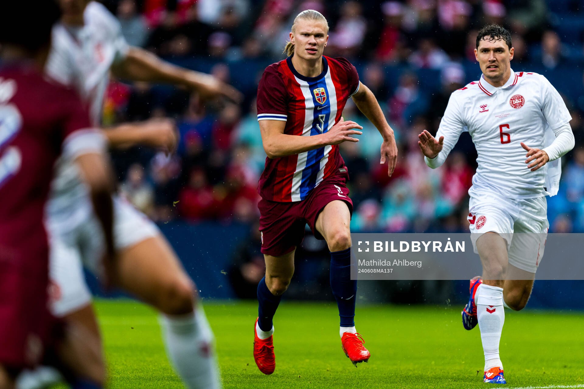 Erling Braut Haaland of Norway and Andreas Christensen of