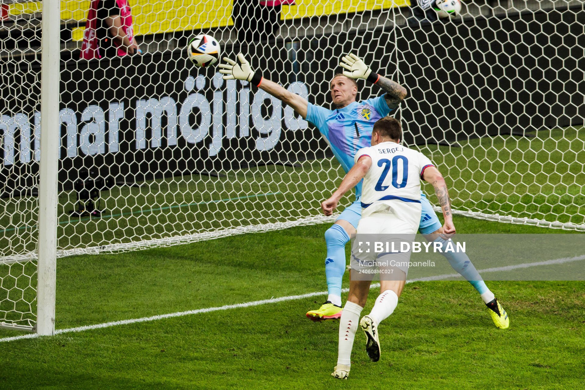 Sergej Milinkovic-Savic of Serbia scores the 0-1 goal