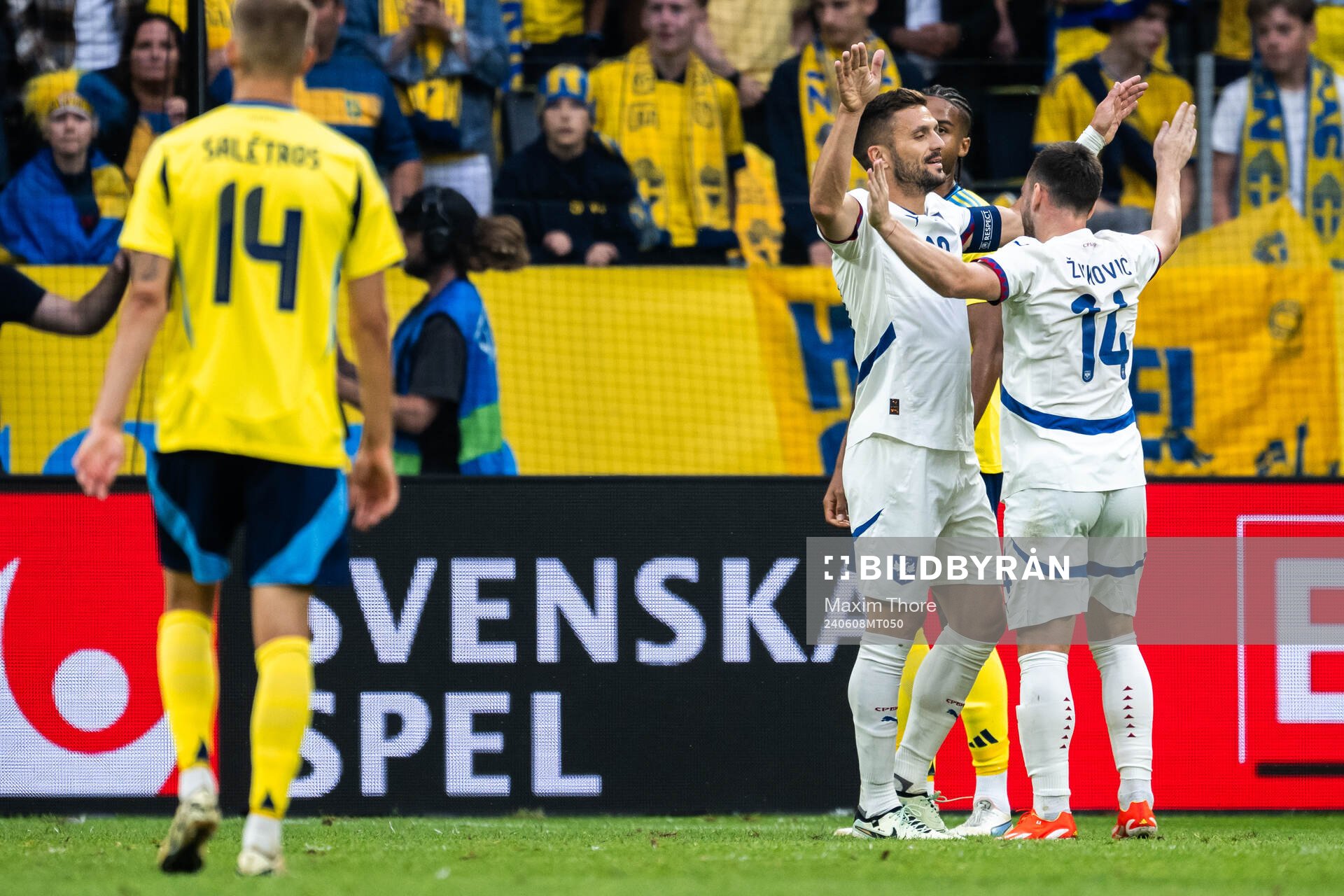 Dusan Tadic of Serbia celebrates
