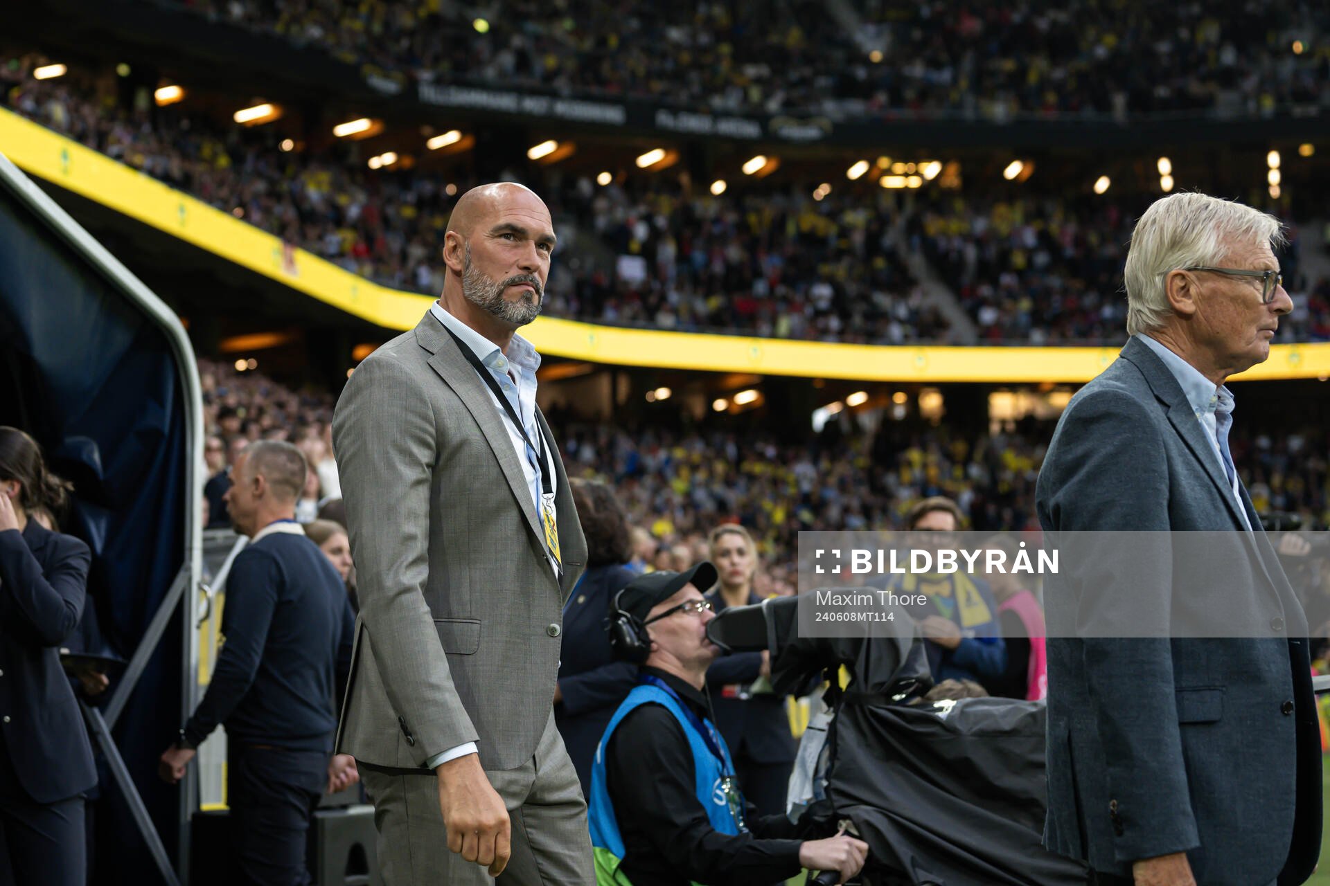 Daniel Majstorovic enters the pitch at a ceremony to honor