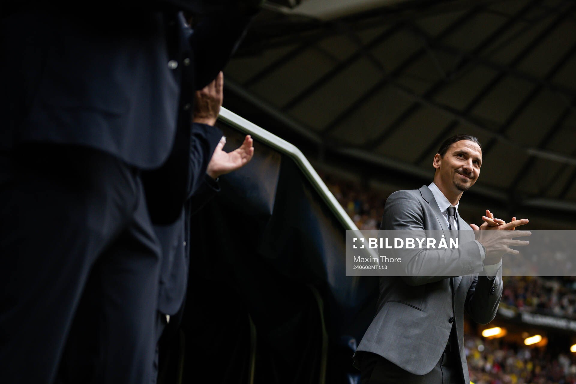 Zlatan Ibrahimovic enter the pitch to a ceremony to honor