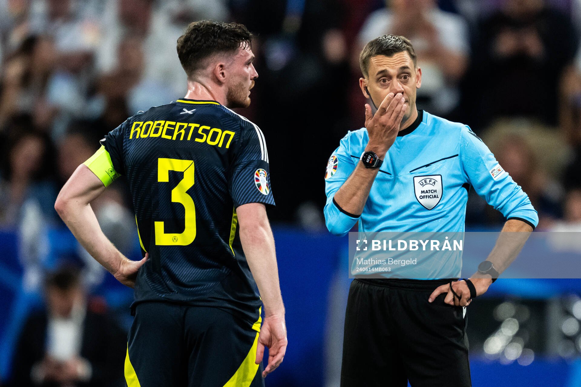 Andrew Robertson and referee Clément Turpin