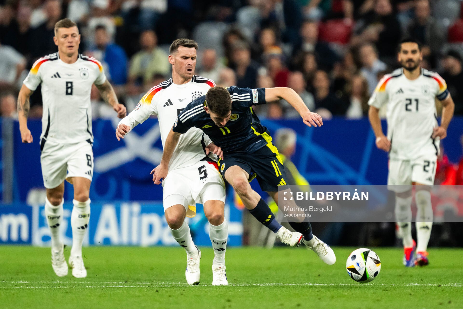 Pascal Gross of Germany and Ryan Christie of Scotland