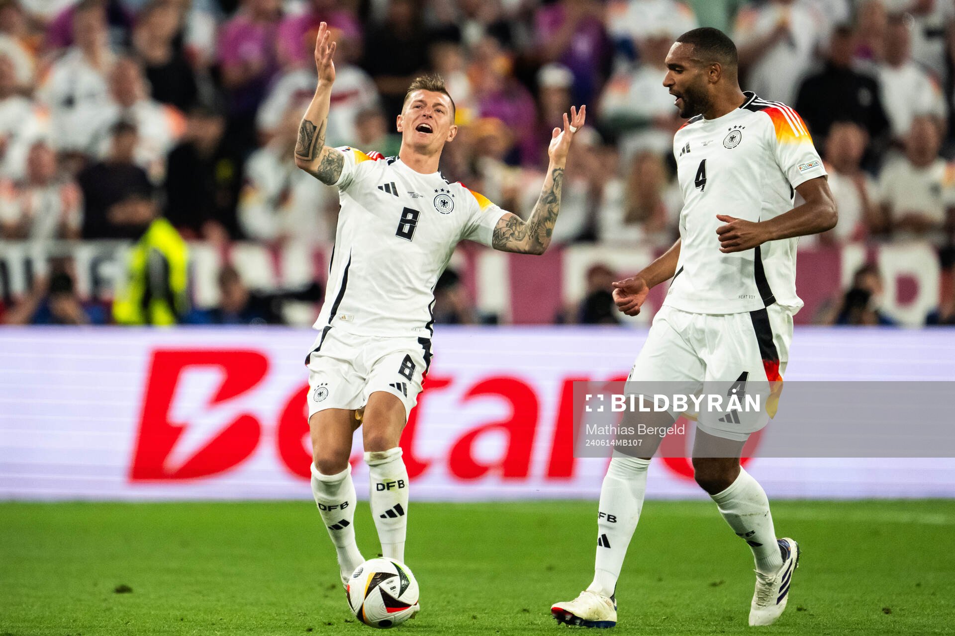 Toni Kroos and Jonathan Tah of Germany