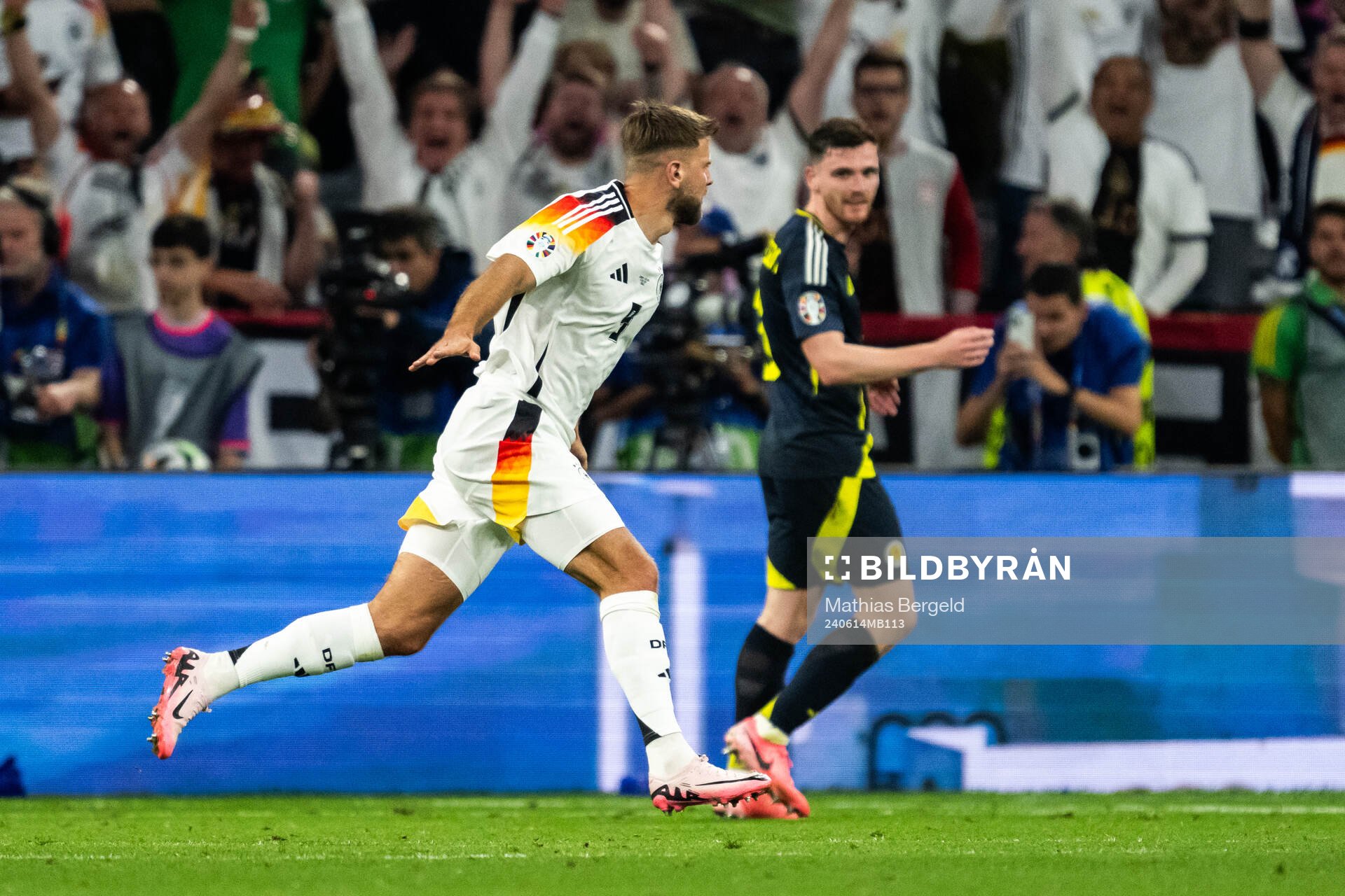 Niclas Füllkrug of Germany celebrate