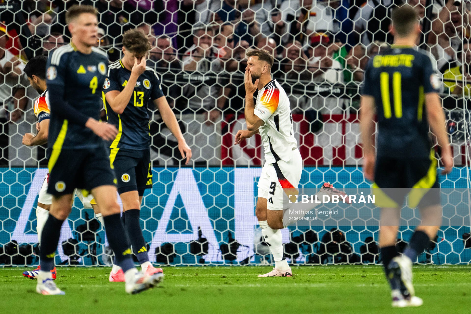 Niclas Füllkrug of Germany celebrate