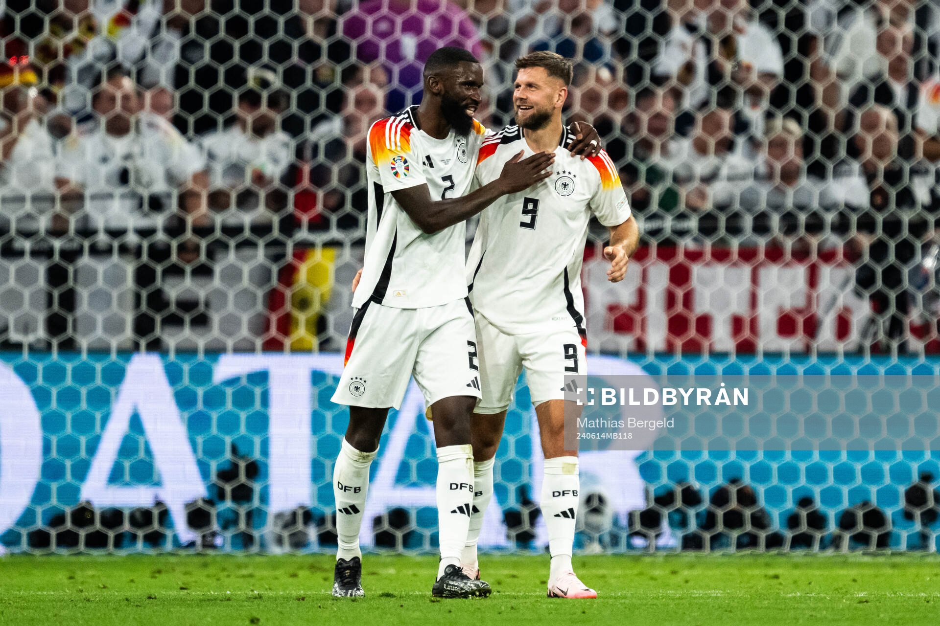 Niclas Füllkrug of Germany celebrate with Antonio Rüdiger