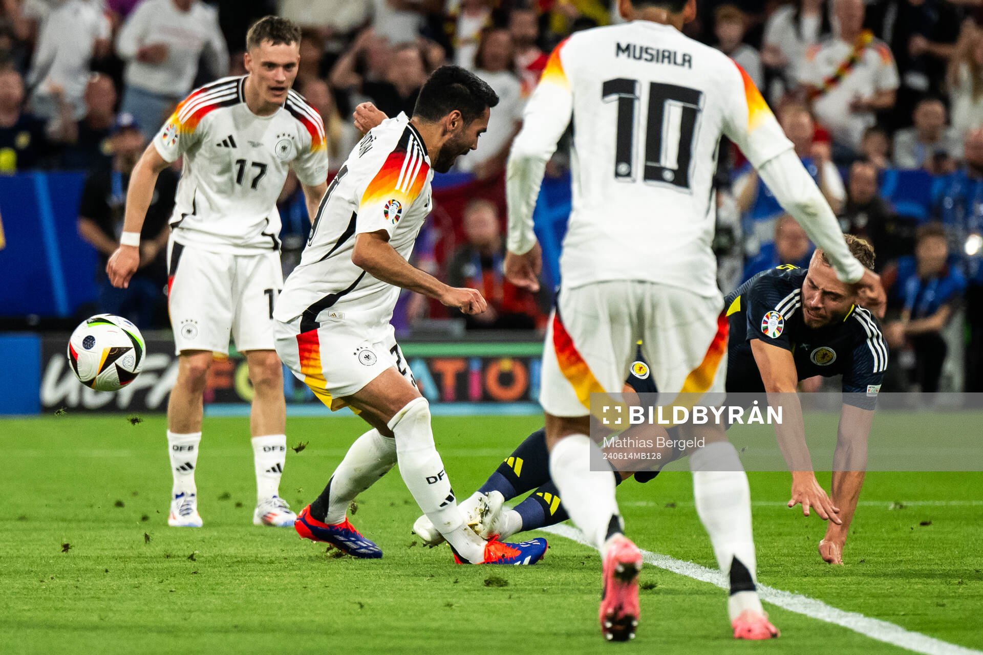 Ilkay Gündogan of Germany and Ryan Porteous of Scotland during the UEFA Euro 2024 Football Championship match between Germany and Scotland on June 14, 2024 in Munich.